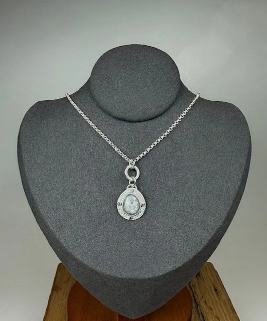 Modern Relic Silver Sapphire on stand.jpg