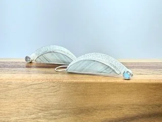 One-of-a-kind Stormbreak Earrings featuring gray-green Saturn Jasper, textured sterling silver and bezel-set labradorite stones