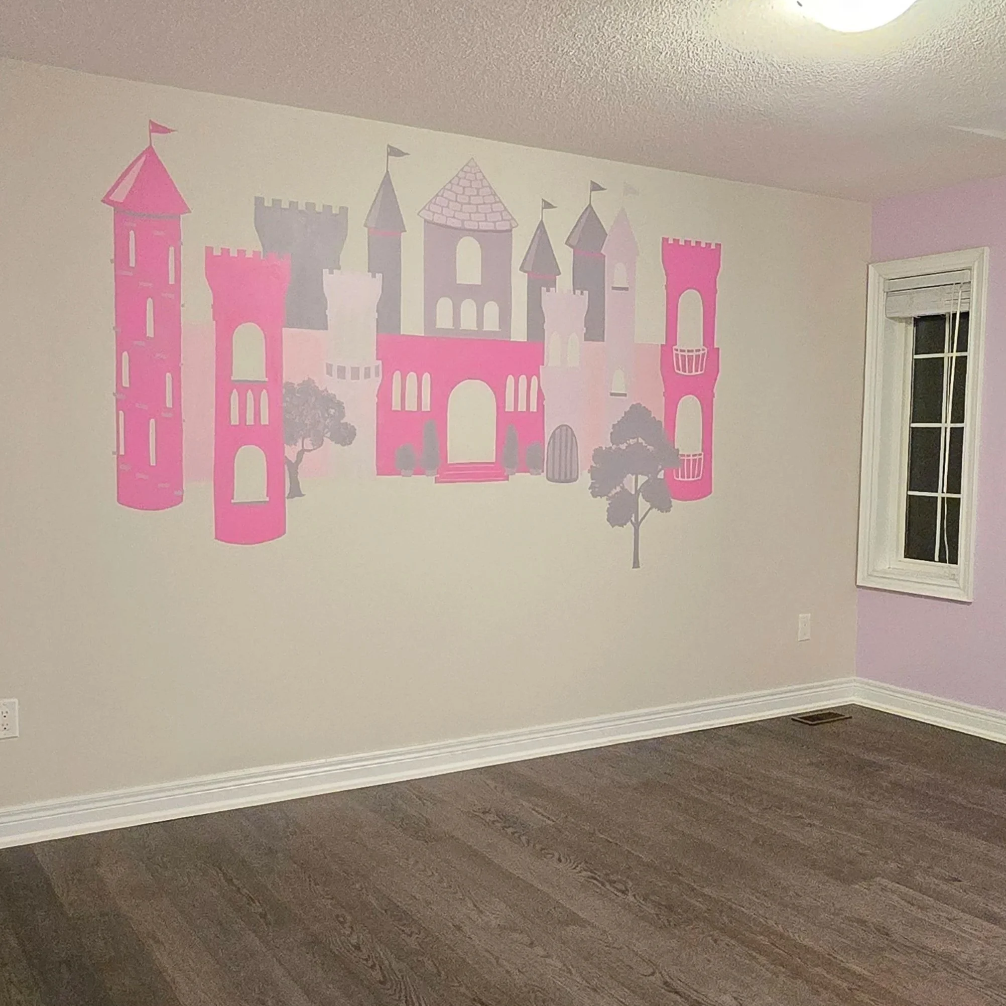 A wall mural fit for a princess to oversee her castle grounds.