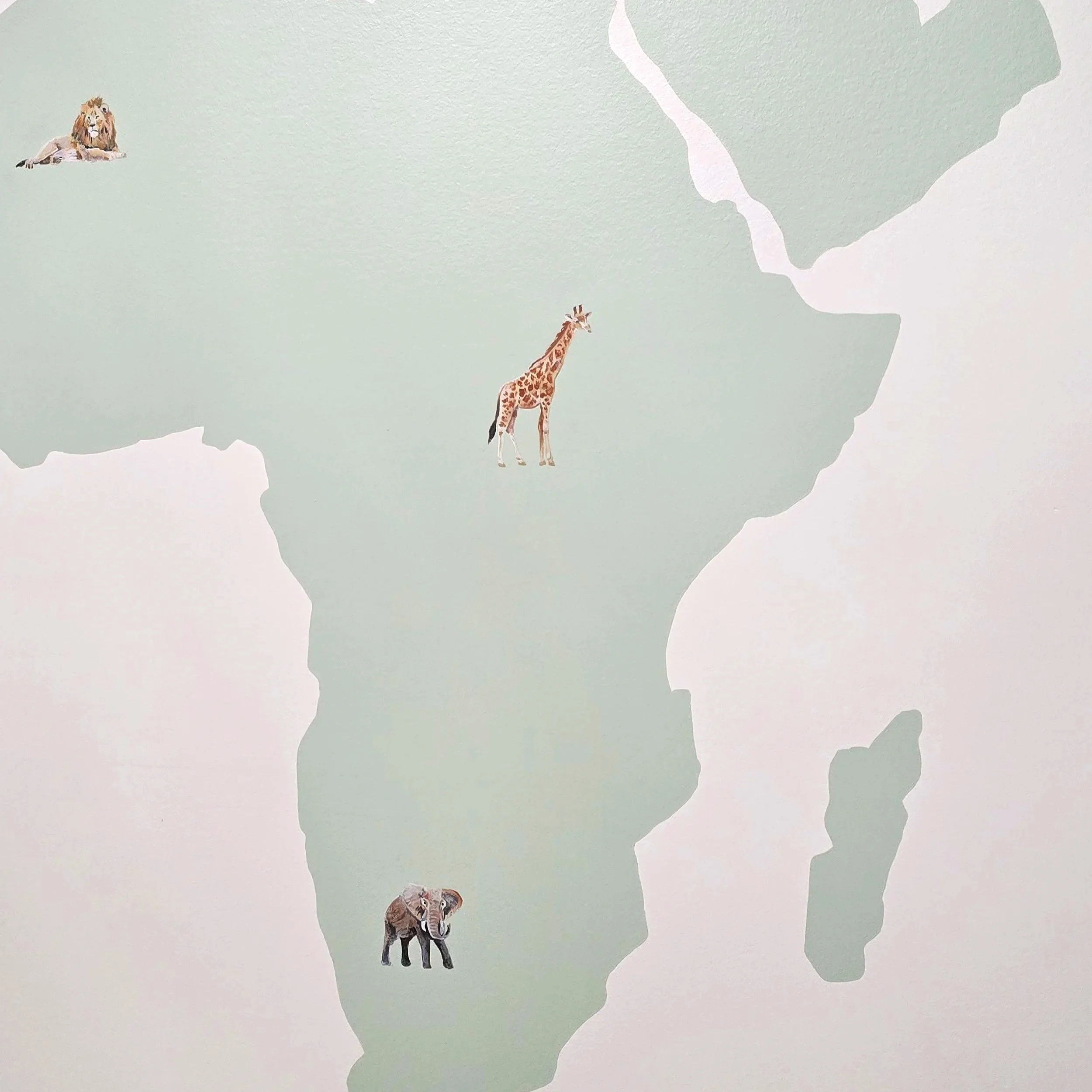 This nursery mural will remain age appropriate for many years thanks to the design choice of painting the animals in a more realistic style.