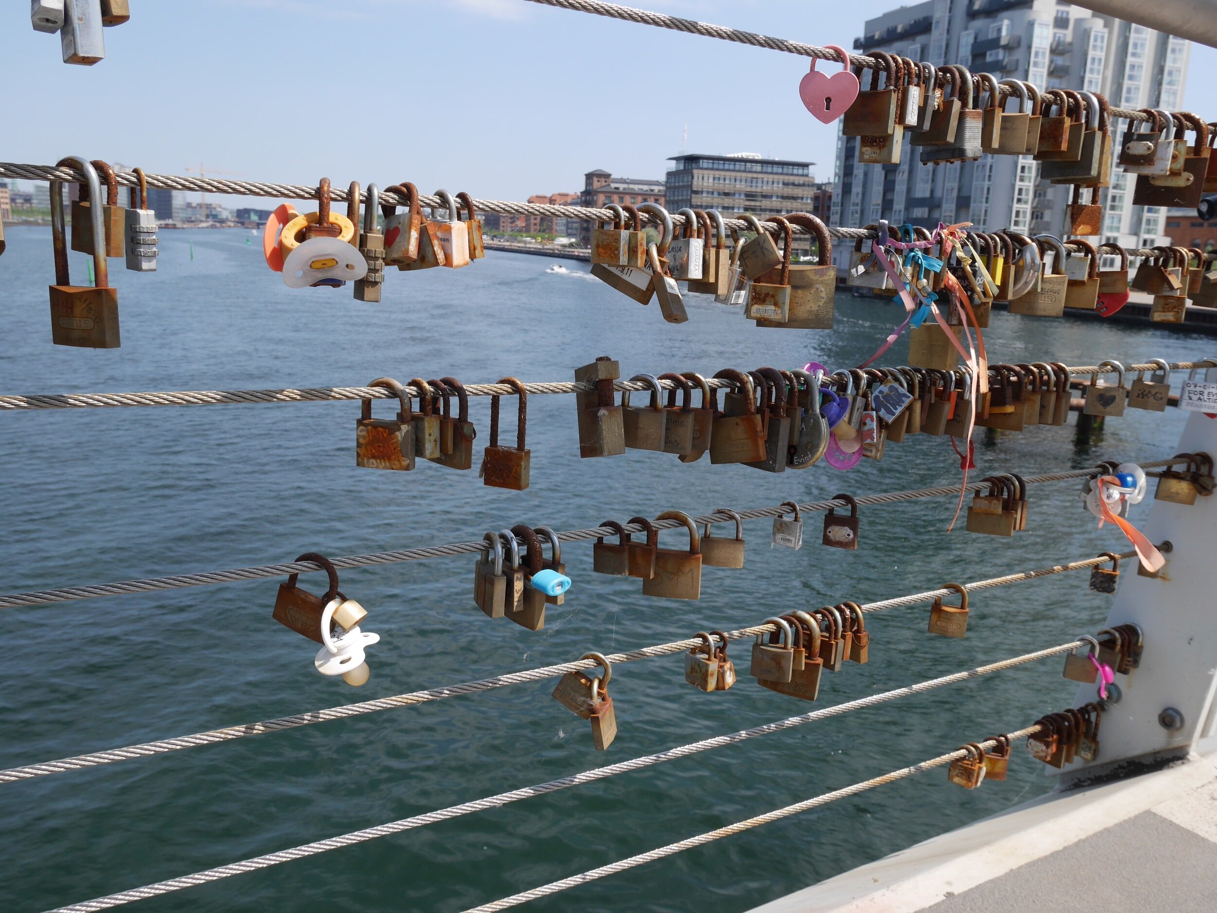 like pont de arts in Paris, the locks of love are catching on in Copenhagen. &nbsp;you can find them on many bridges throughout the city.&nbsp;