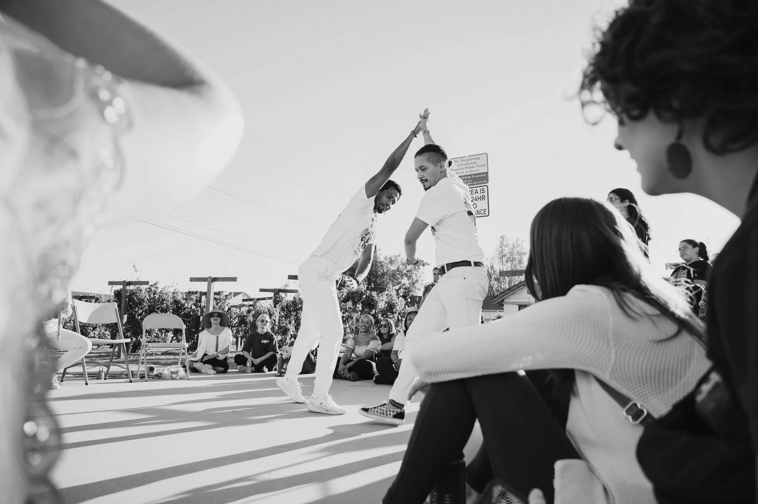 Nico Zuluaga and Brian Shields of Kapoeira N'gola Preto Velho play a game of Capoeira de Angola