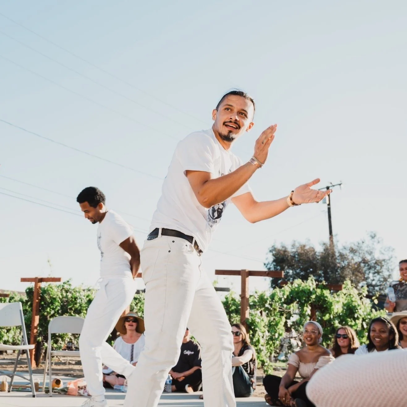 Nico Zuluaga and Brian Shields of Kapoeira N'gola Preto Velho play a game of Capoeira de Angola