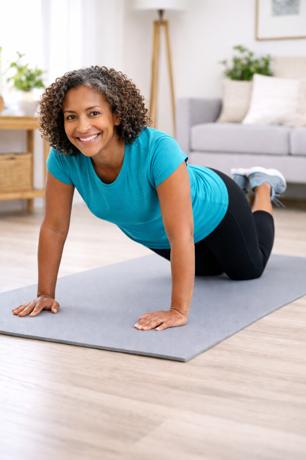 Middle aged African American doing a push up