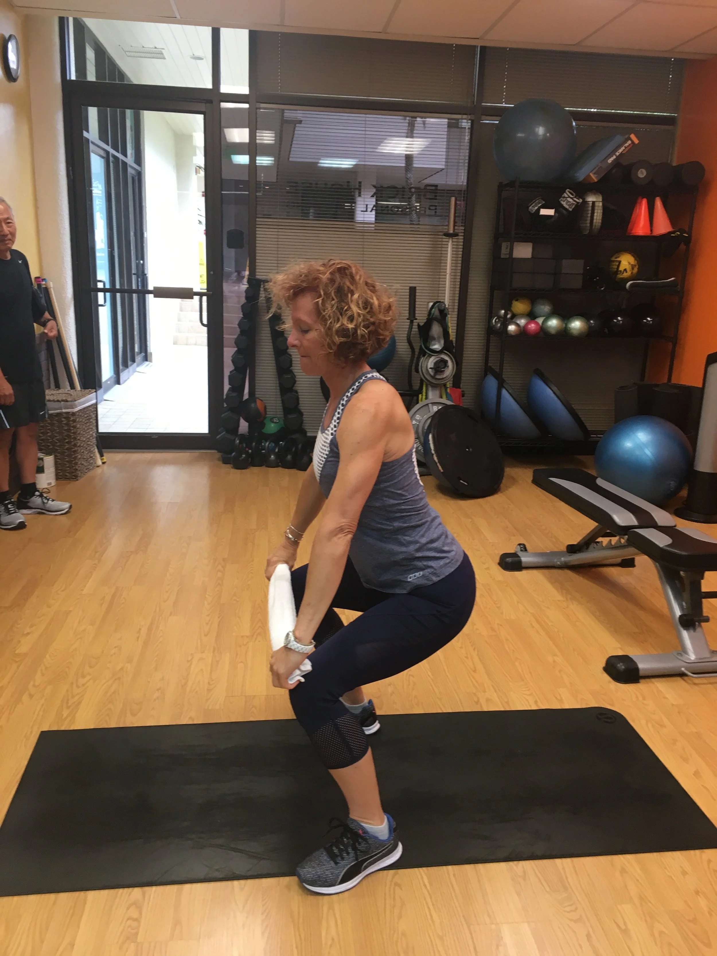 Kim working on a prehab exercise