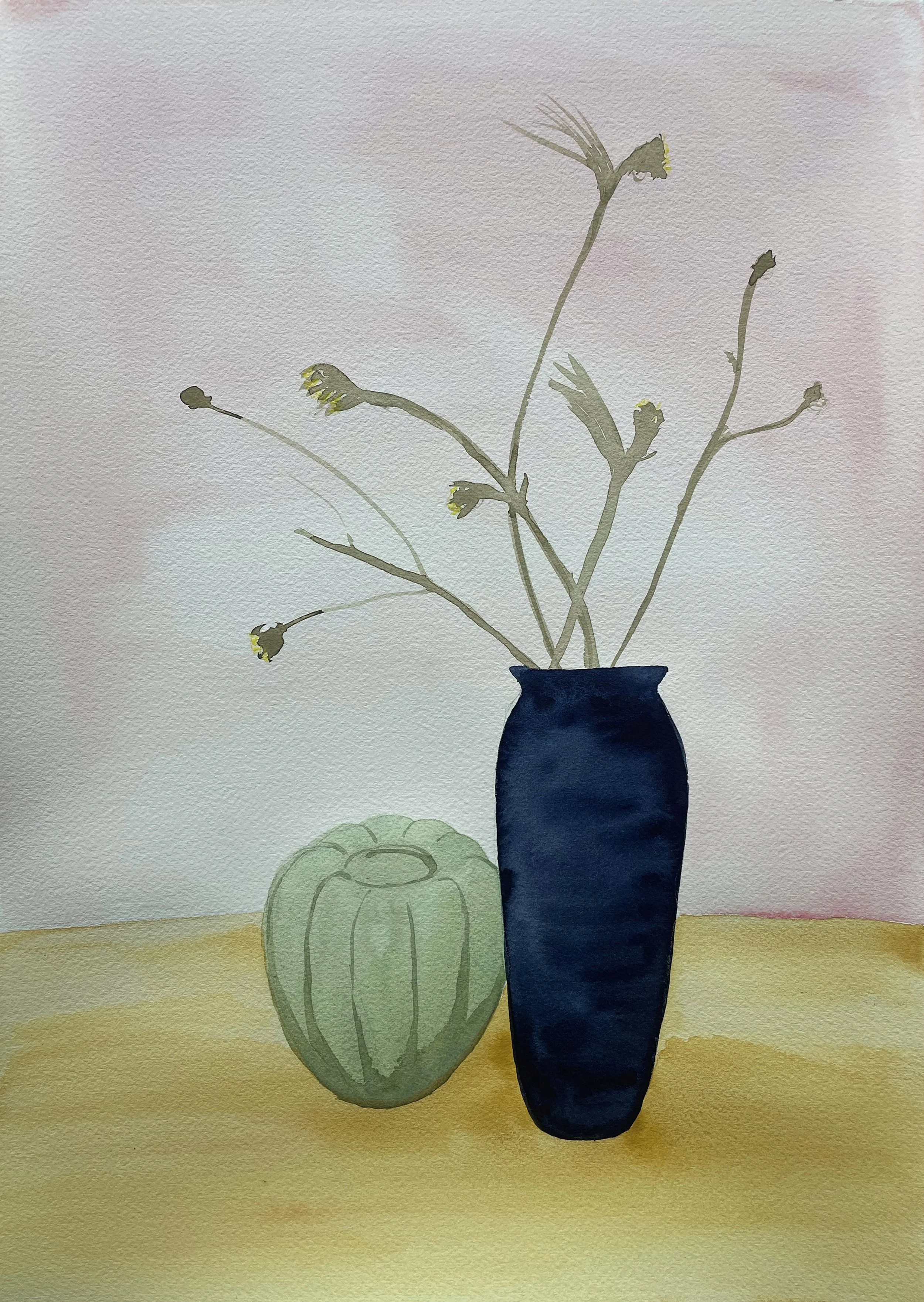 Watercolor painting of a dark blue vase with dried flower stems and a green round object on a yellow surface, with a pastel background.