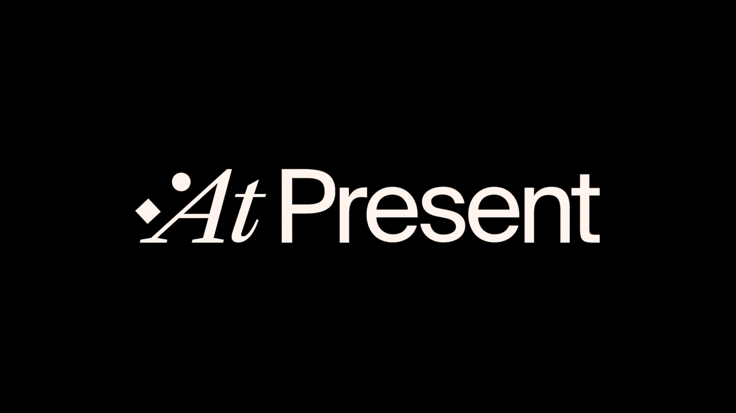 The word 'Present' with the words 'At' and a slash symbol slanted over it, on a black background.