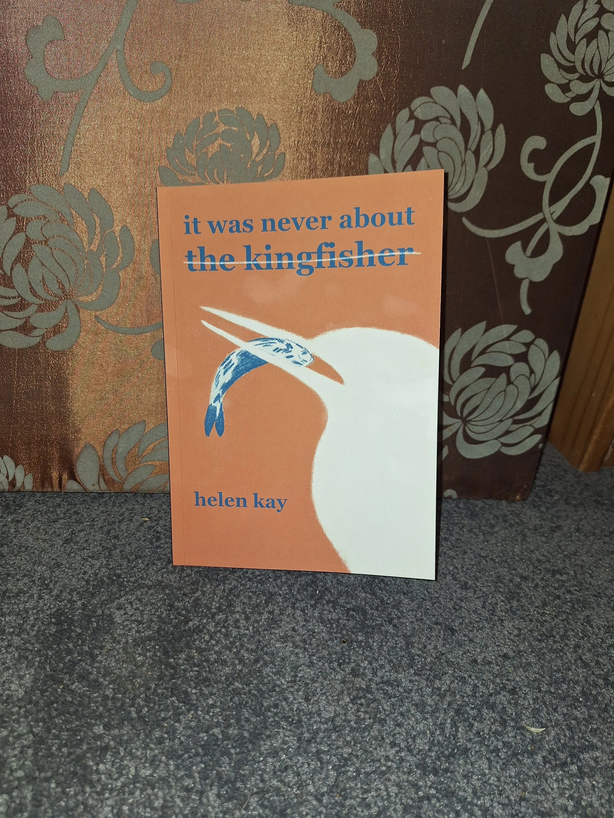 Front cover of the poetry chapbook It Was Never About the Kingfisher by Helen Kay, Dithering Chaps Press