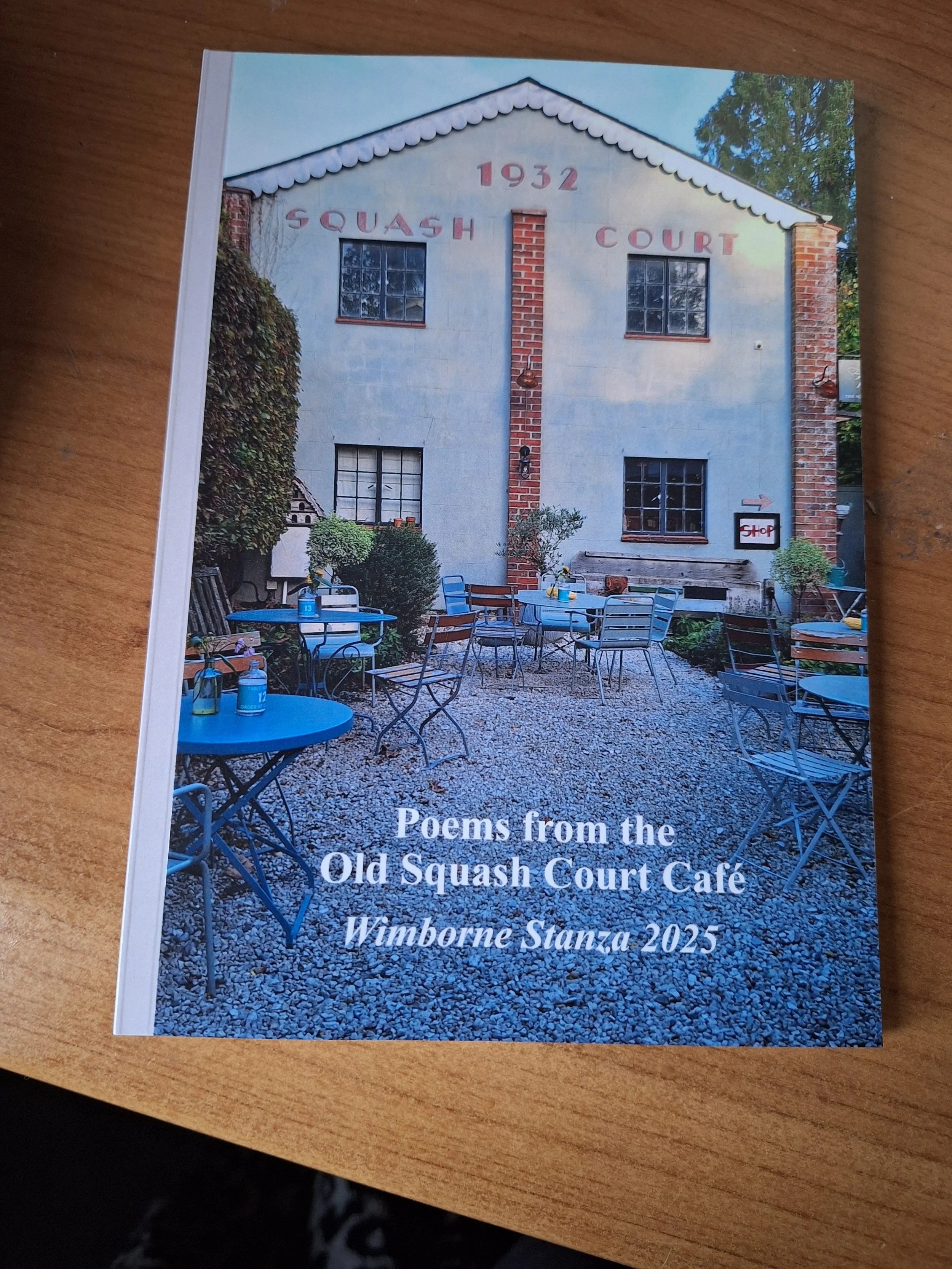 Cover of 'Poems from the Old Squash Court Café', a poetry chapbook by members of the Wimborne Stanza Group, published by Dithering Chaps.