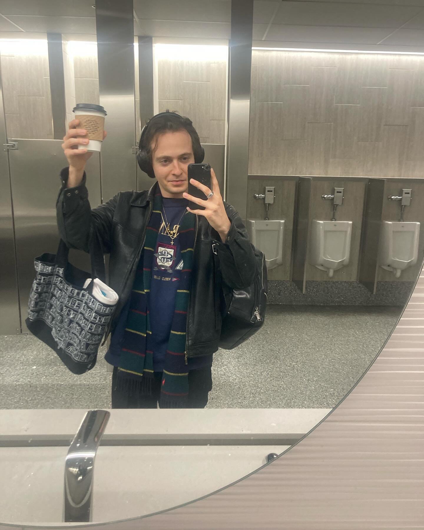 Just touched down in the belly of the beast. Reppin&rsquo; my alma mater @bongojava ☕️ Have you seen this new terminal at BNA? Spiffy. Also, excuse the urinals :~)