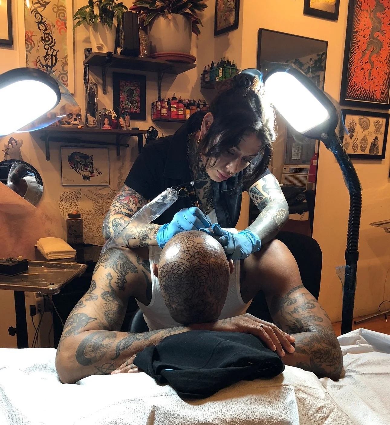 Older photo i snapped of kati tattooing with the assistance of thee classic vintage dbl floor lamps AND recent B.A. tattoo by @kativaughn WARNING the skin is real in the photo but the titties are a tattoo!