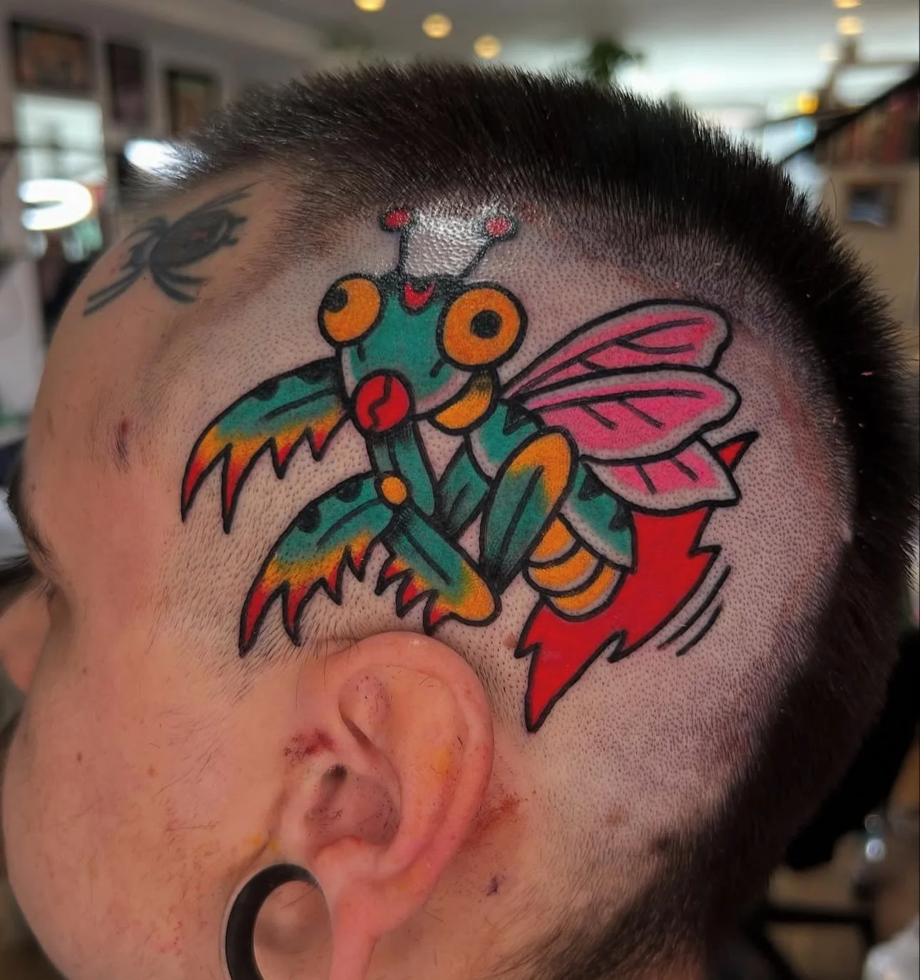 #henboheadtattoo today at #GLNYC 

that tadpole 🐸 strawberry 🍓 is calling your name 🪄 

henbotattoo@gmail.com 
for booking