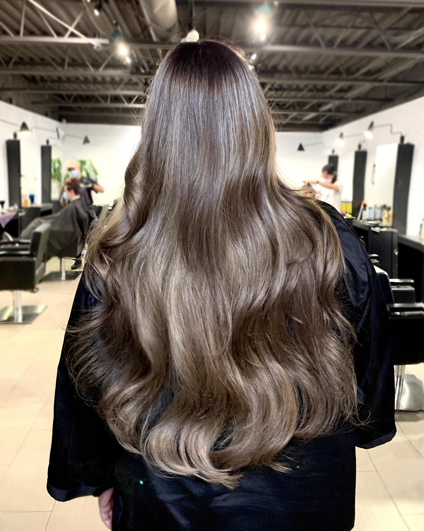 &bull; Even though warmer colours are being embraced these days&hellip; (YAY!) we still love a good smokey ash brown on long luscious hair. Swipe for her before! 😮&zwj;💨
⠀⠀⠀⠀⠀⠀⠀⠀⠀
5 hrs &bull; Balayage, Cut &amp; Style by: Thanh @thanh3rz 
⠀⠀⠀⠀⠀⠀⠀⠀