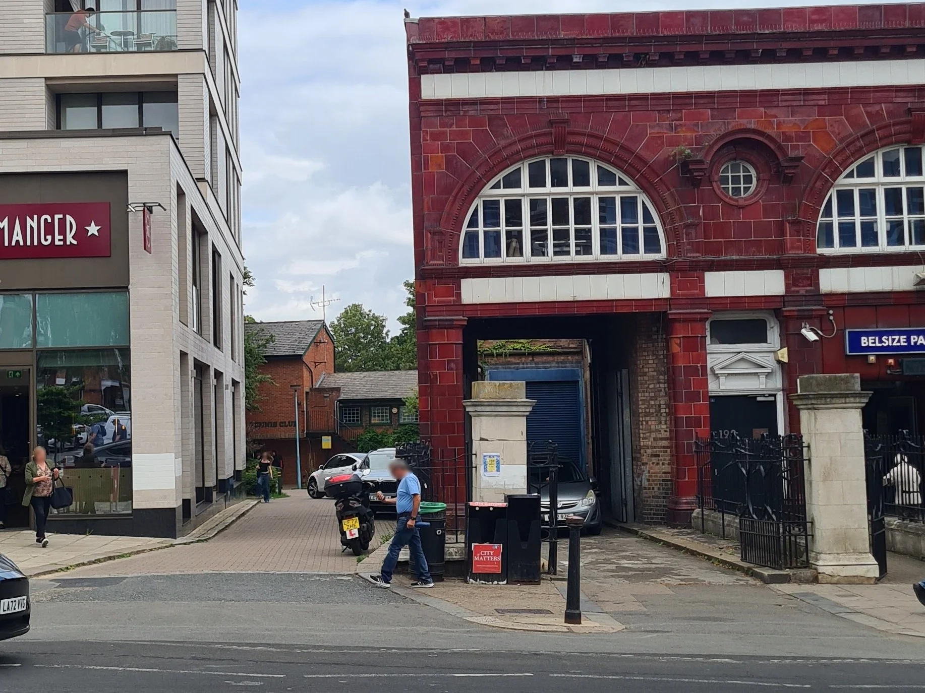 Street view of an alley next to Belsize Park underground station.