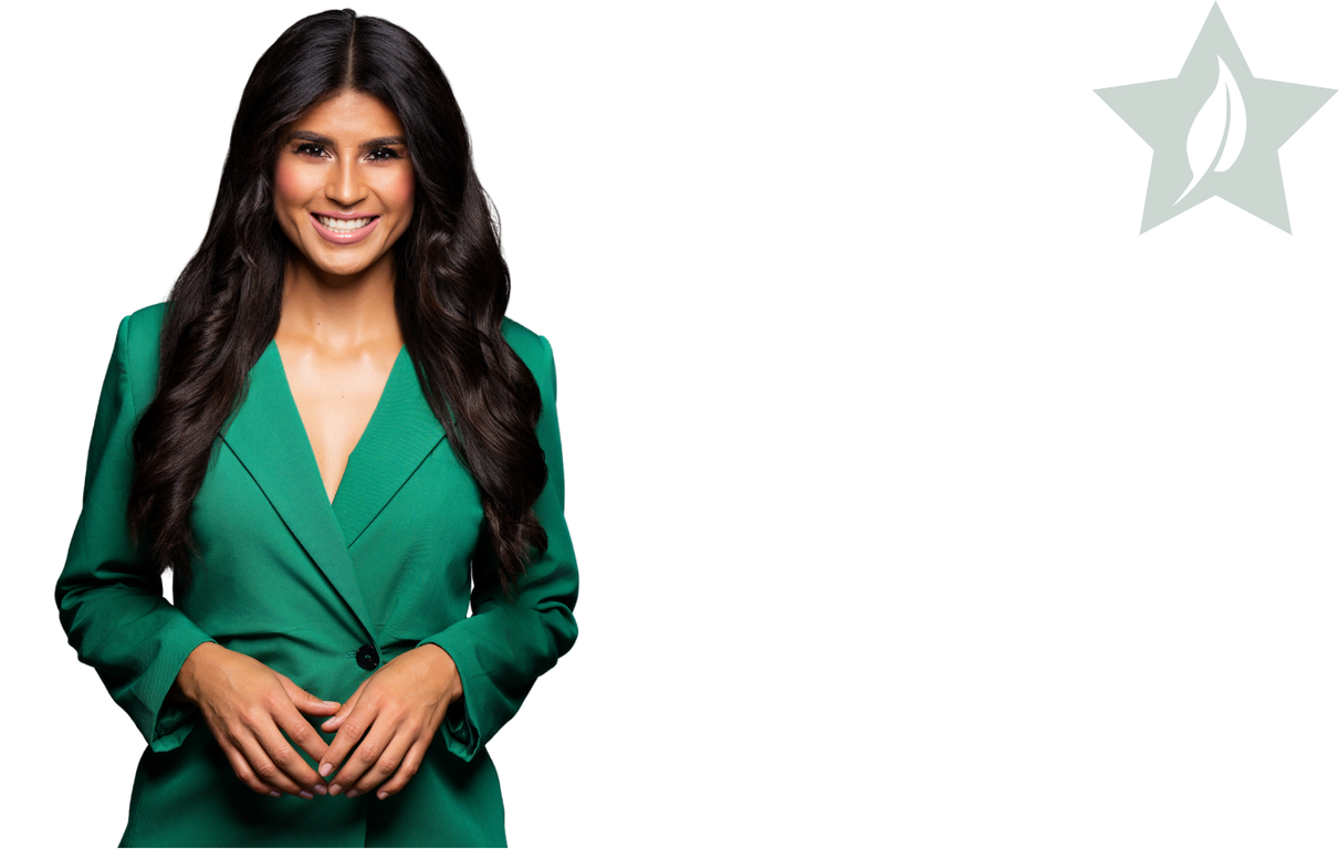 A woman with long dark hair smiling, wearing a green blazer, and standing against a white background. A star with a leaf design is on the top right.