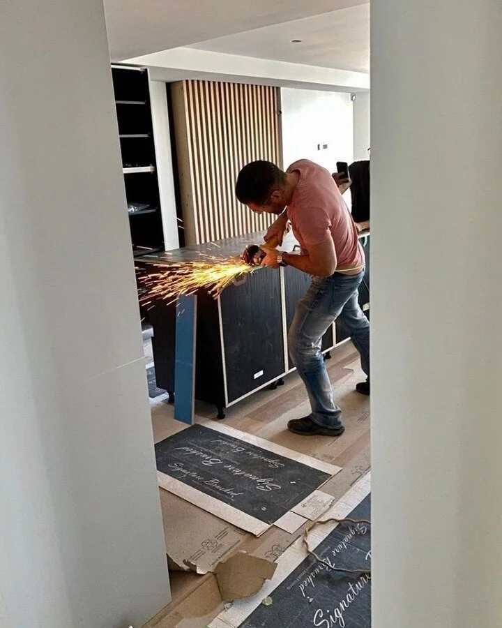 SPARKS &amp; ACTION⁣
Sparks were flying on site when the metal panels were being scribed to create a perfect fit. Who needs actual fireworks when you have your own personal show within your apartment? ⁣
Photo credit: @workinginthegray