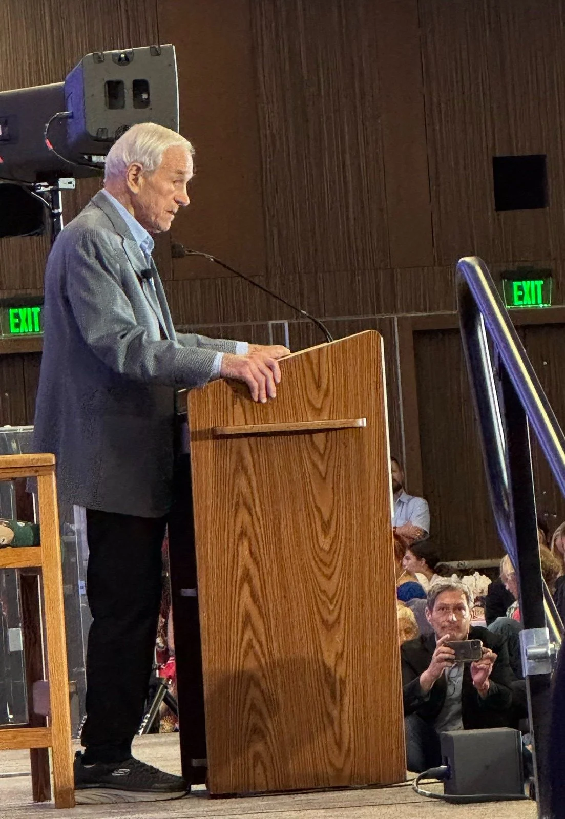 Still Standing Strong. Even as he turns 90 years old, Ron Paul seems to never slow down. As the final speaker at his own birthday, Dr. Paul delivered a 40 minute talk to the crowd on the dangers of central banking and the Federal Reserve.