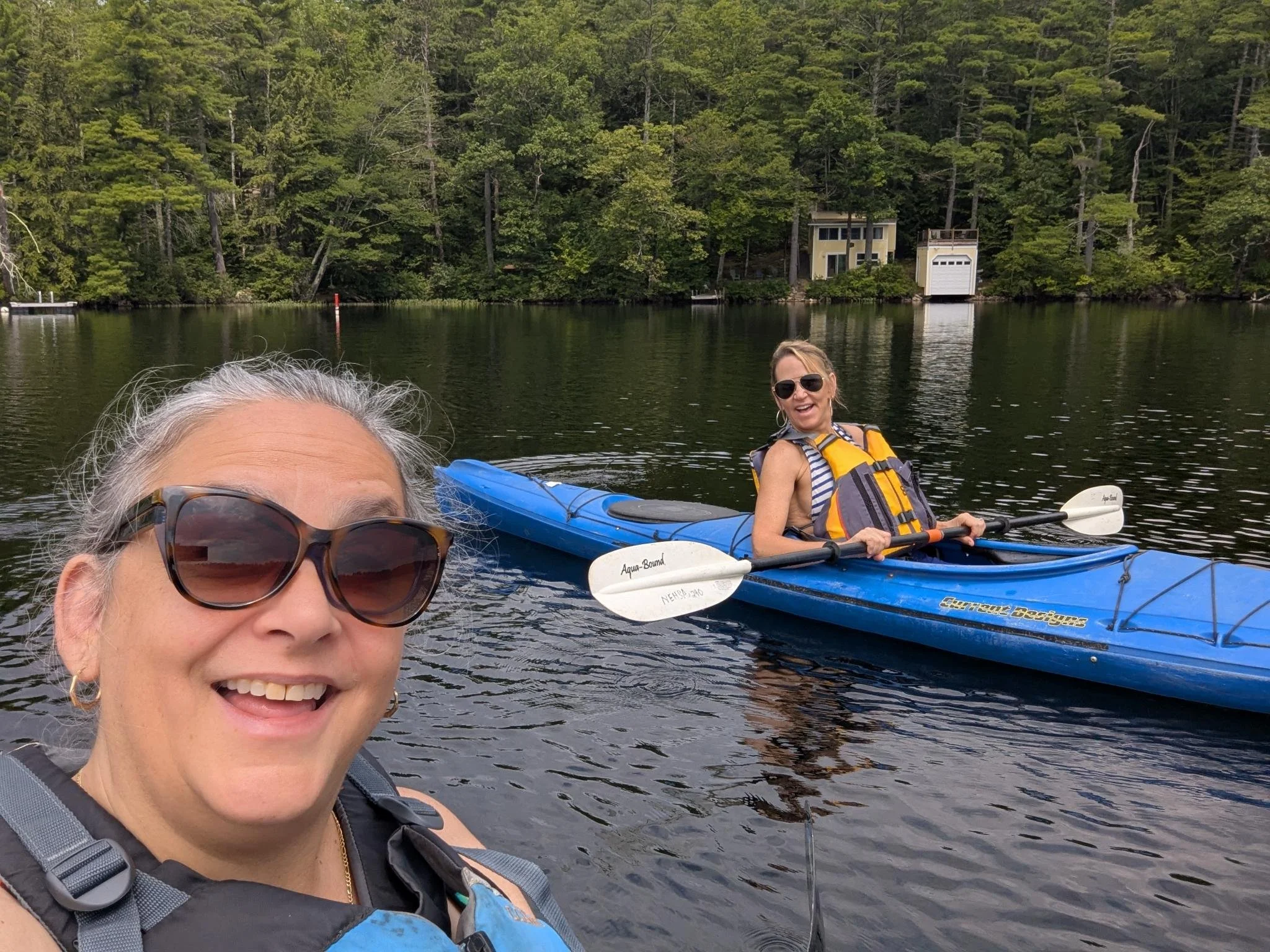 Out on the Lake! Welcome and Engagement Director, Chris Lopez, enjoys some kayaking with her sister on a hot August day.