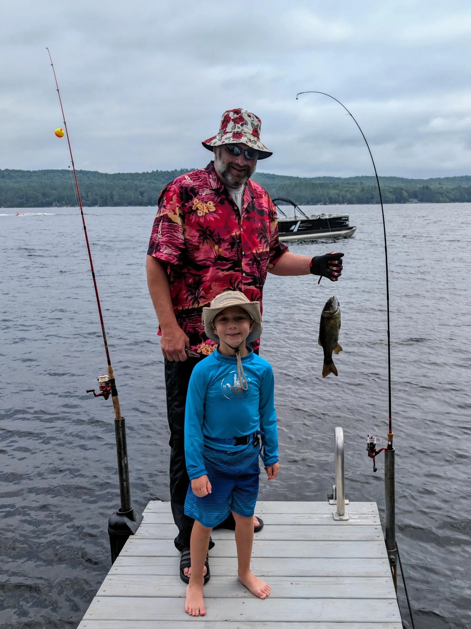 On the lake. Free Stater Kevin Haley and his son enjoy a summer day fishing off the dock from one of New Hampshire's many pristine lakes.