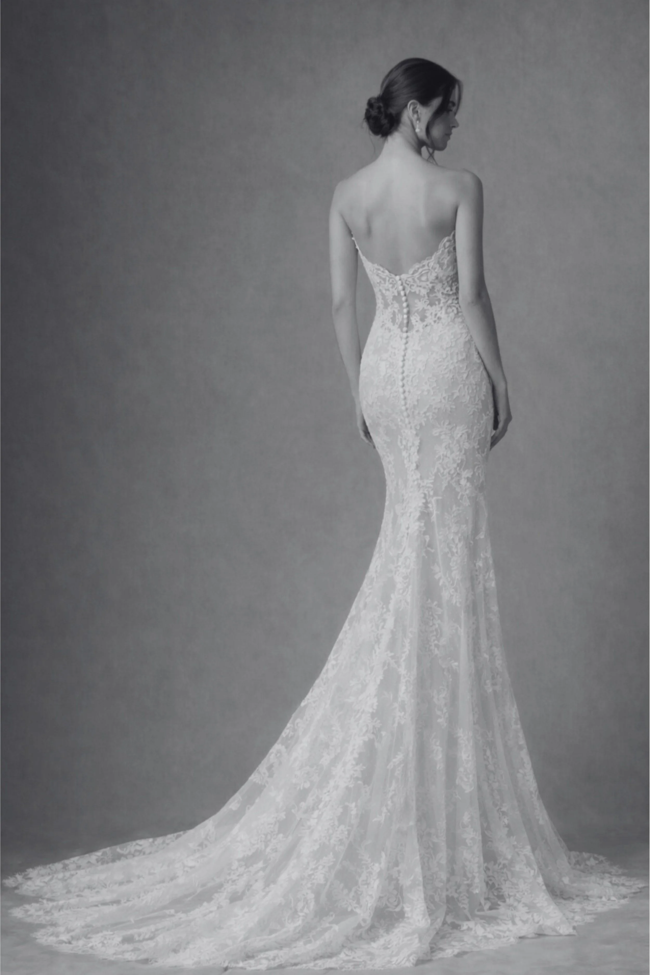 Off-the-shoulder lace wedding dress with illusion lace back, long sleeves, fitted silhouette