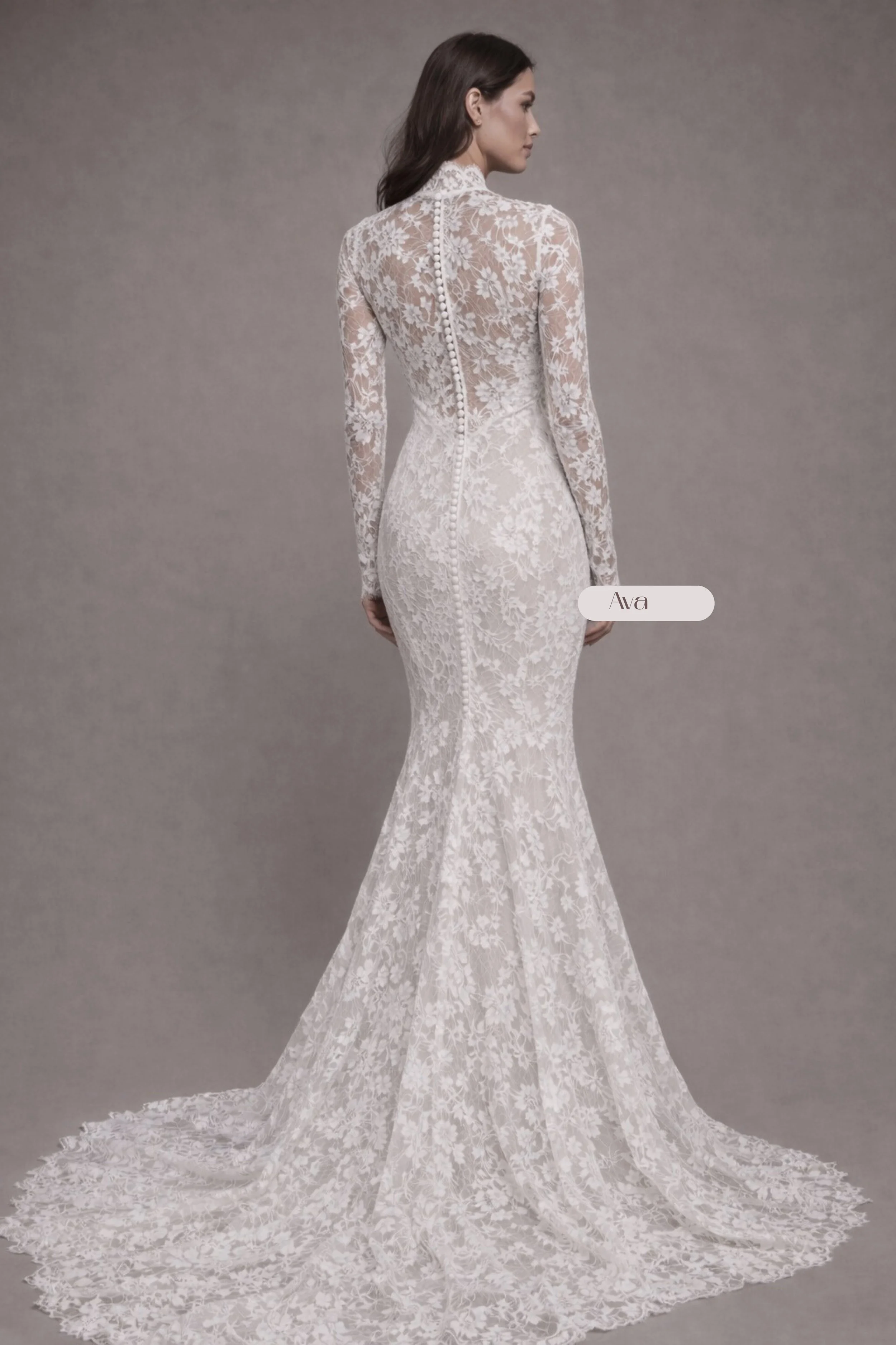 Modest lace mermaid wedding dress with high neckline, long sleeves, and cathedral lace veil