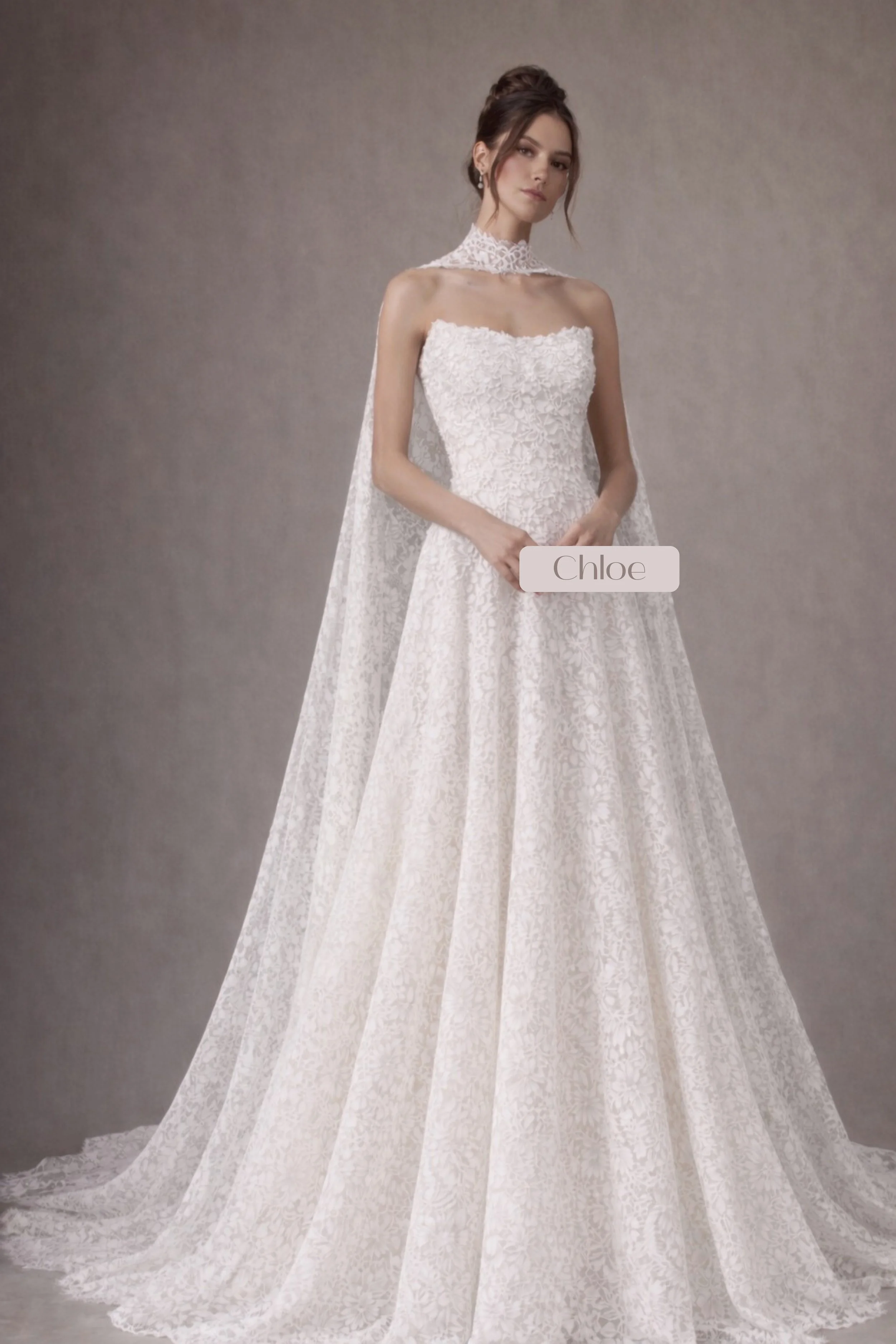 Strapless lace A-line wedding dress with detachable high-neck lace cape and long train