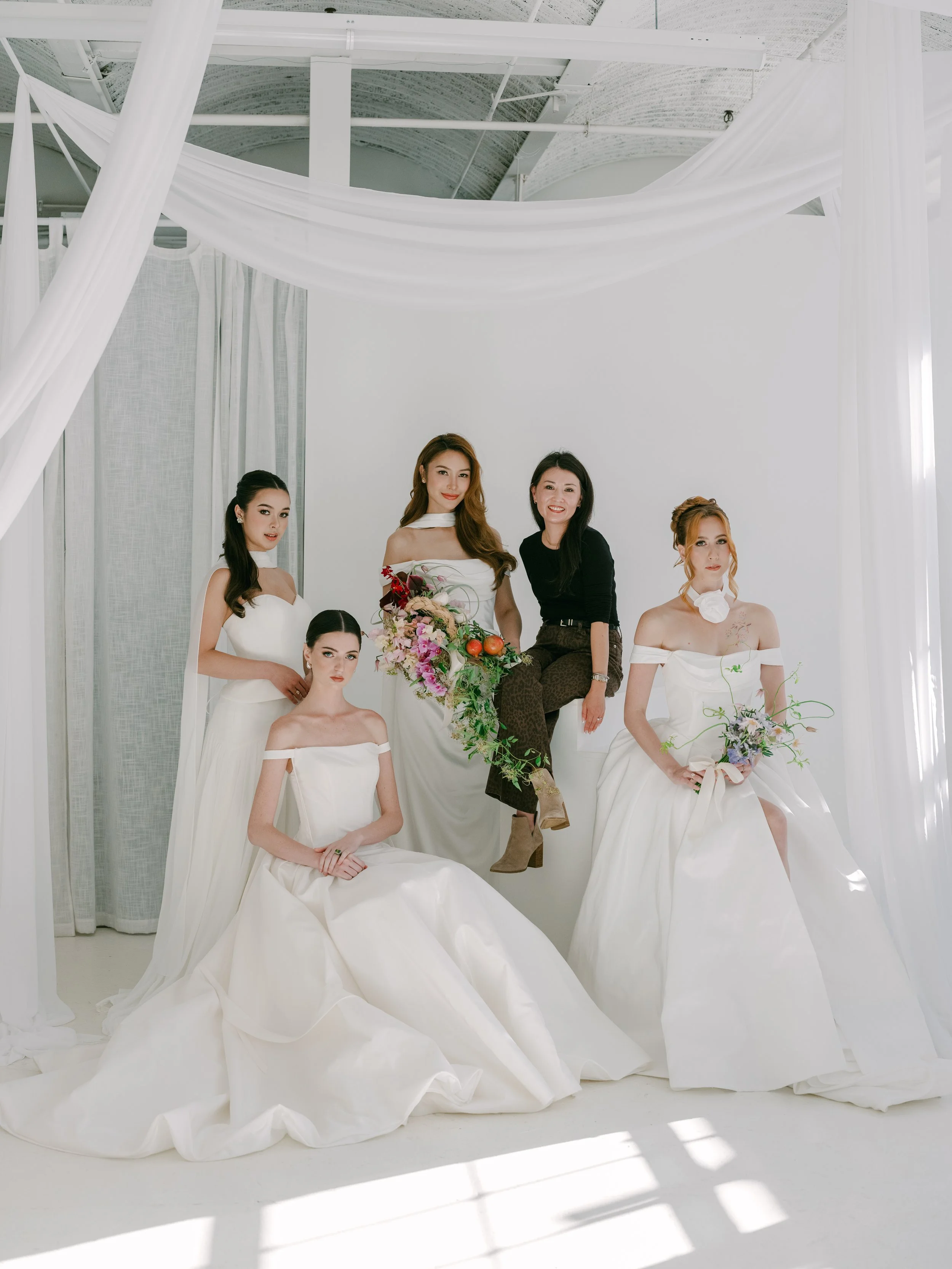 Akmaral Noecker- designer with models