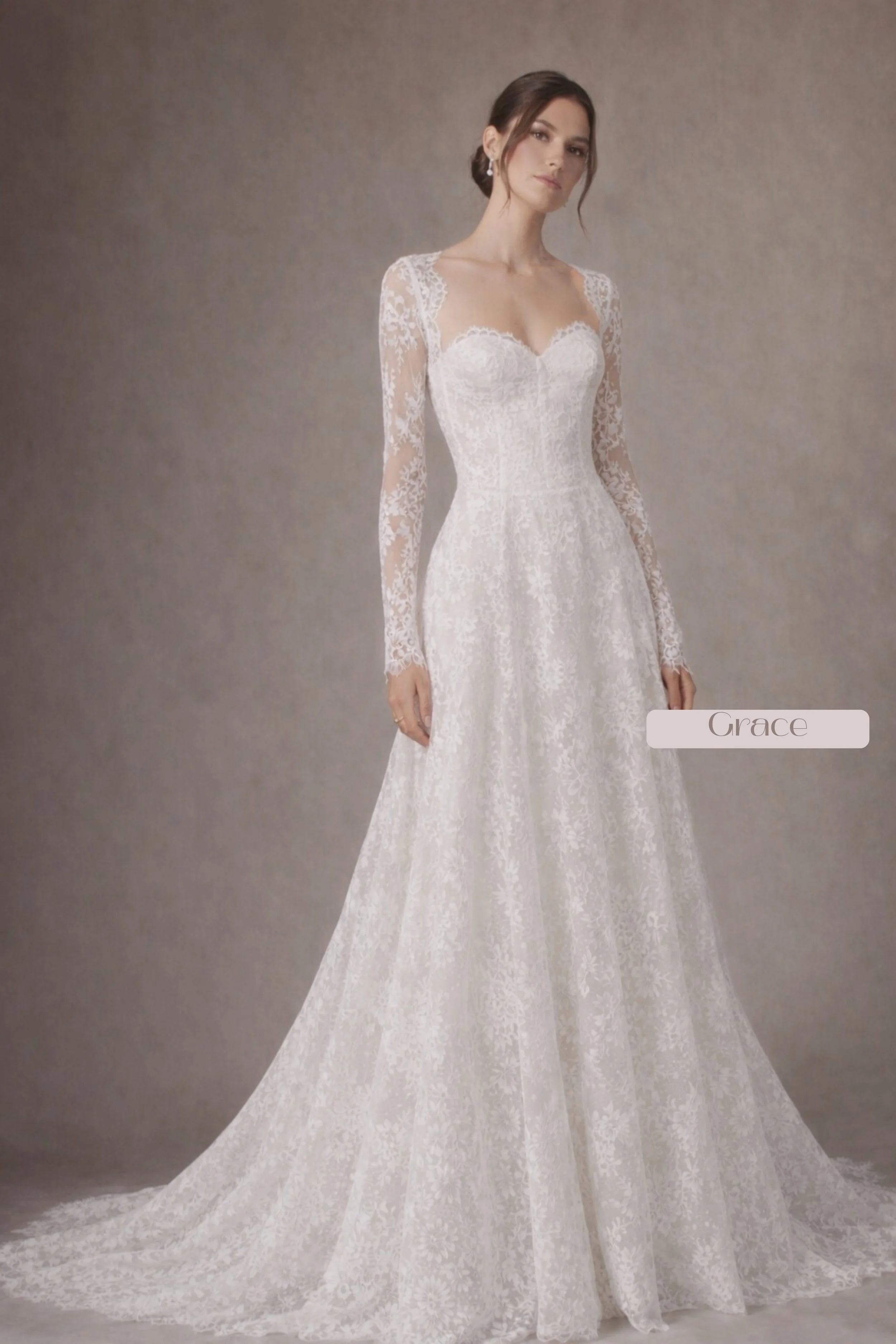 Long sleeve lace A-line wedding dress with sweetheart neckline and chapel train