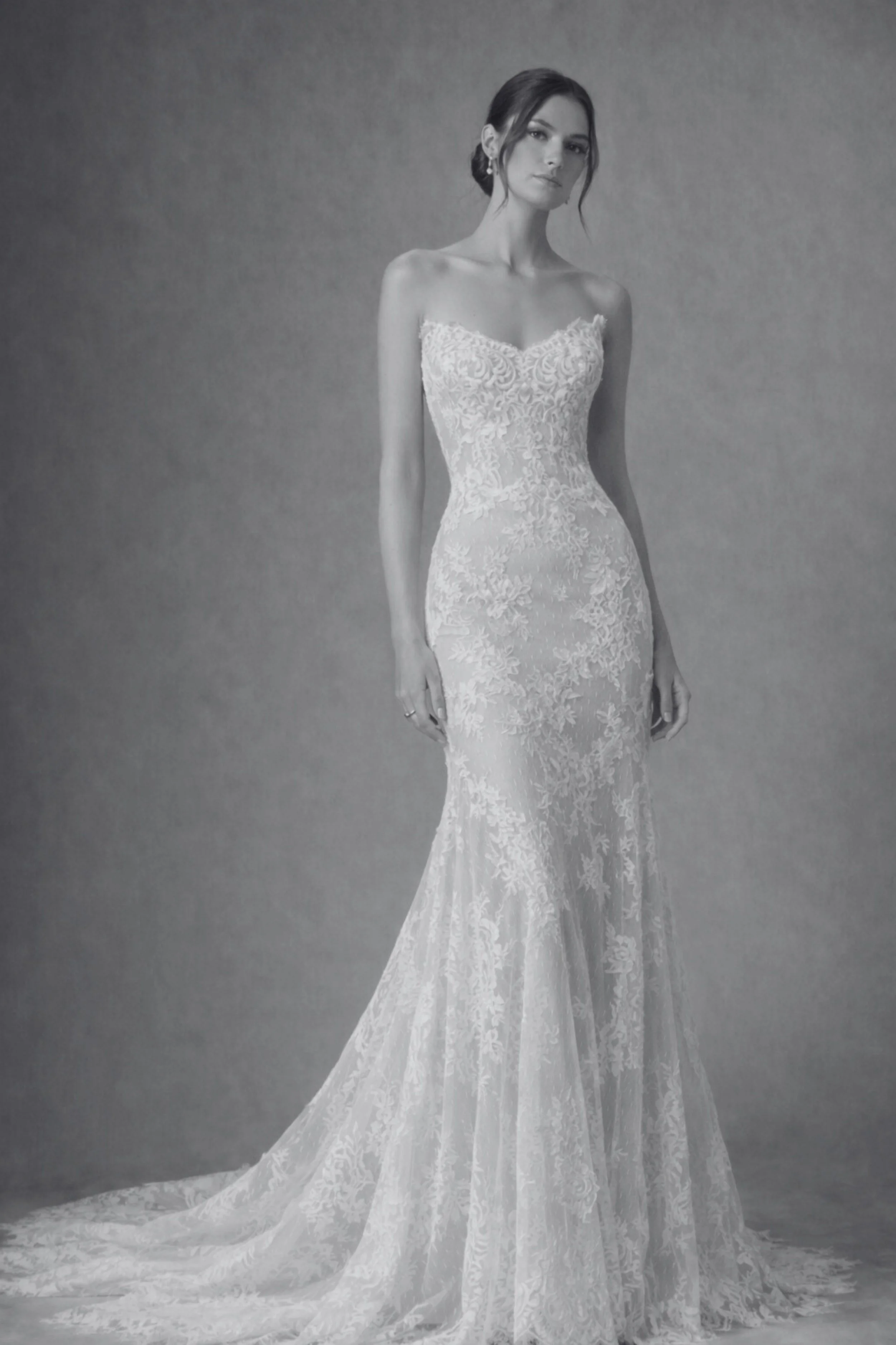 Off-the-shoulder lace wedding dress with illusion lace back, long sleeves, fitted silhouette