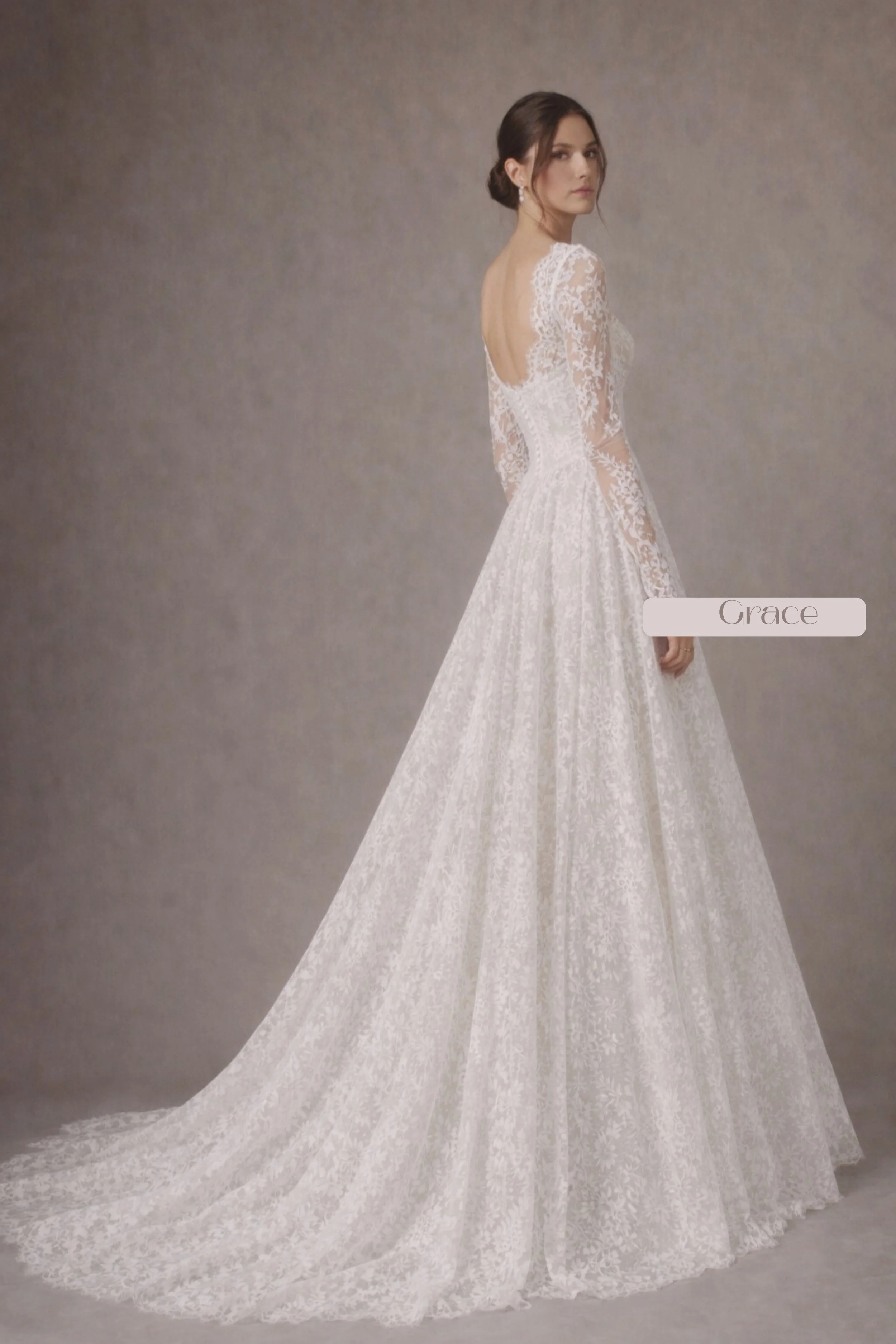 Long sleeve lace A-line wedding dress with sweetheart neckline and chapel train