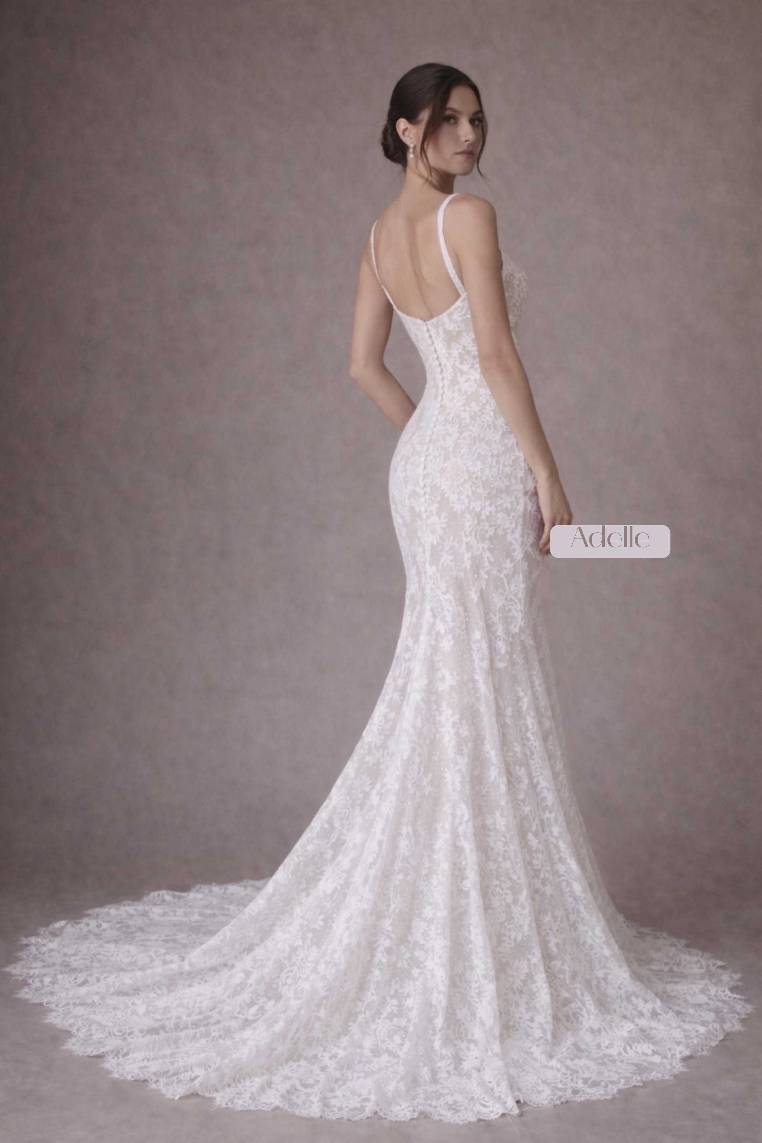 Floral lace fitted wedding gown with square neckline, low scoop back, and lace train