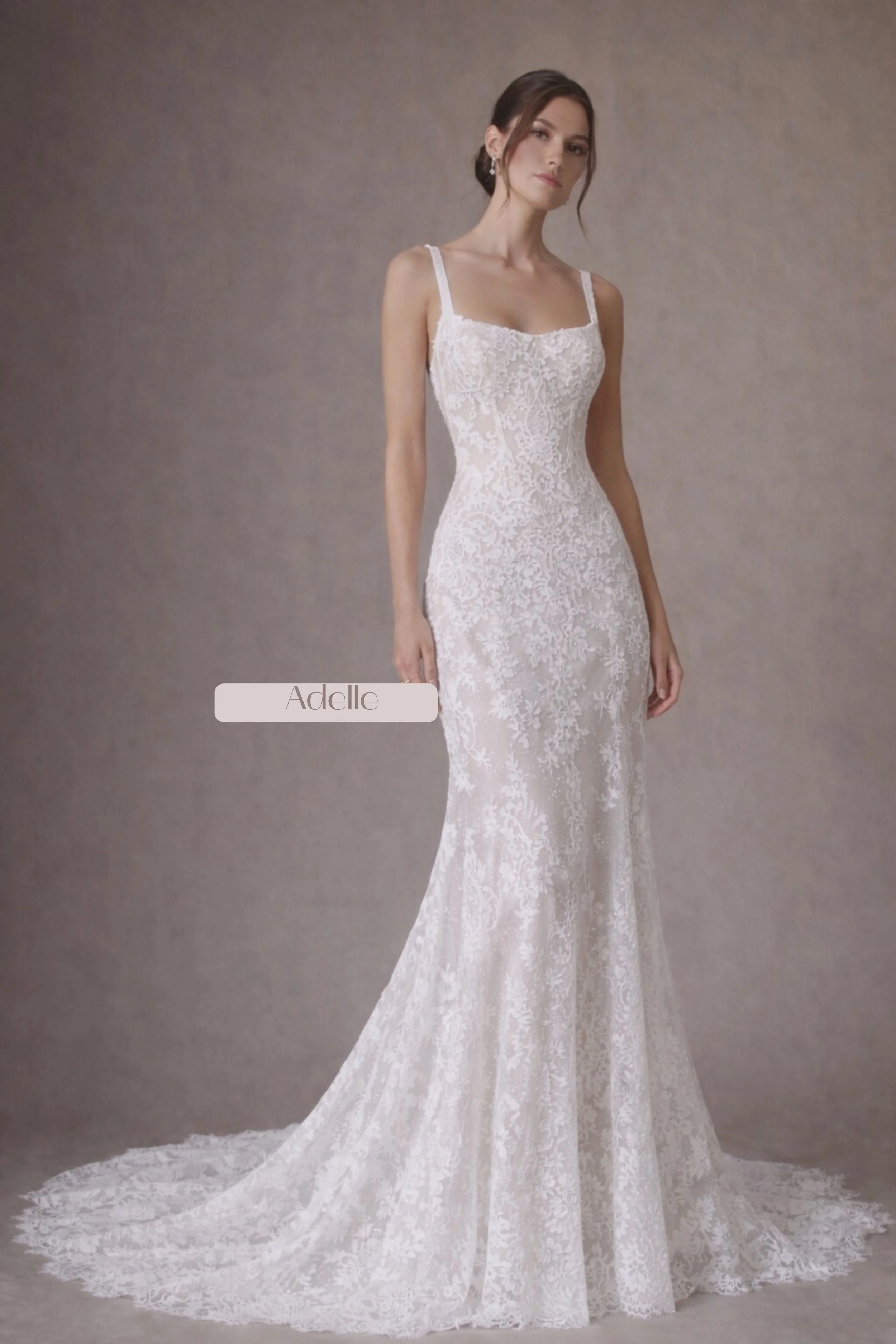 Floral lace fitted wedding gown with square neckline, low scoop back, and lace train