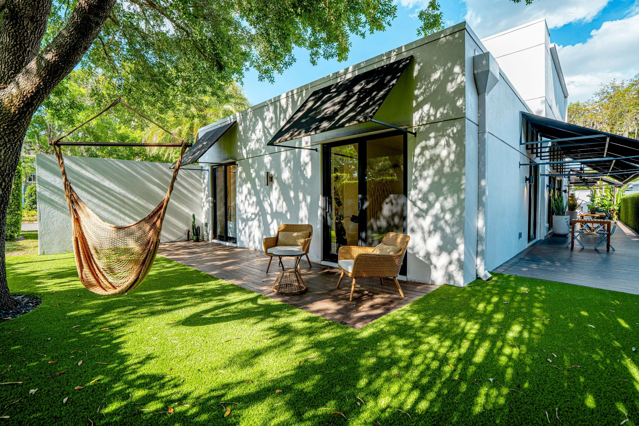 modern-home-winter-park-fl-446-melrose-21-backyard-patio-hammock.jpg