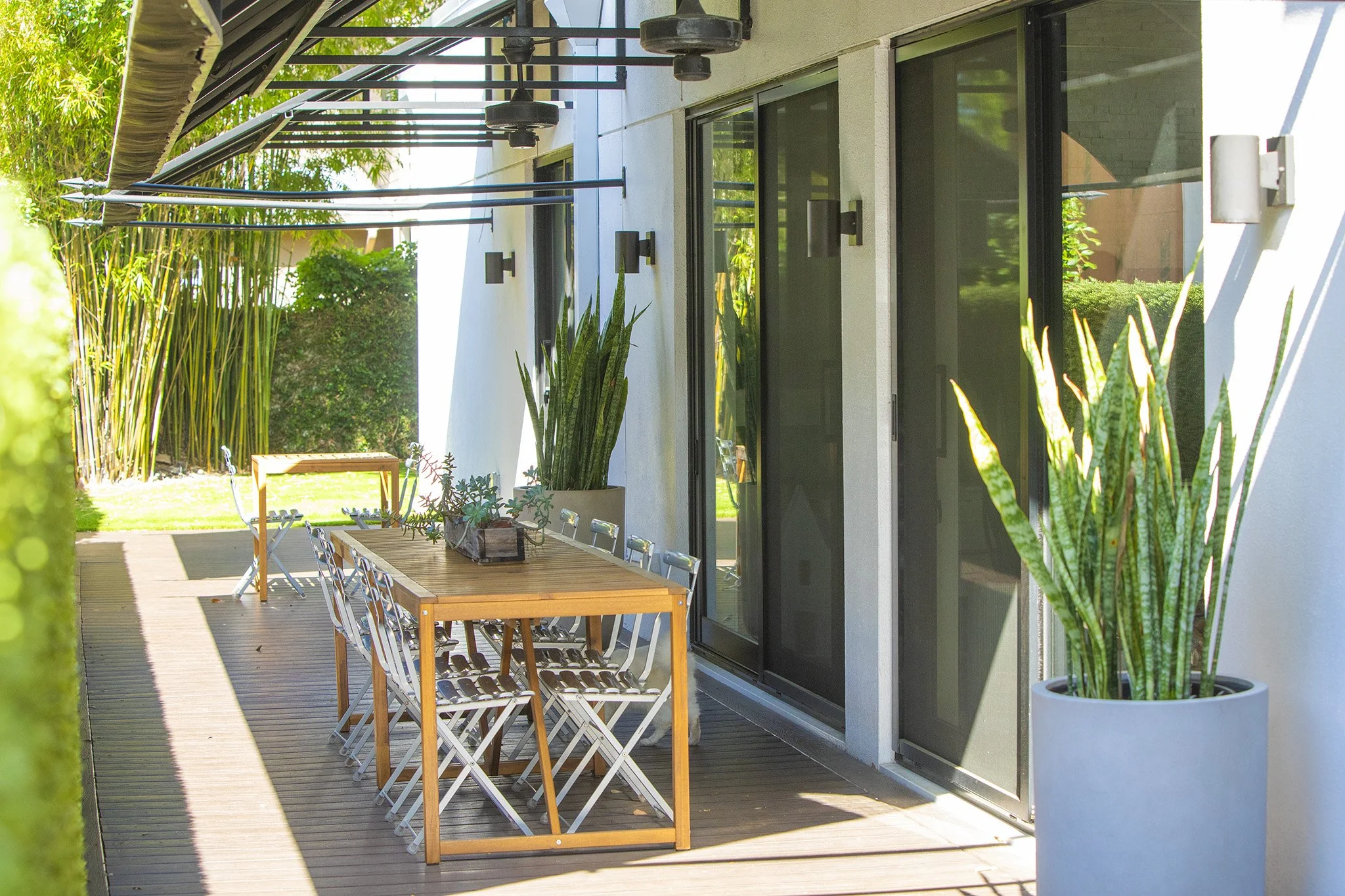 modern-home-winter-park-fl-446-melrose-23-outdoor-dining-covered-patio.jpg