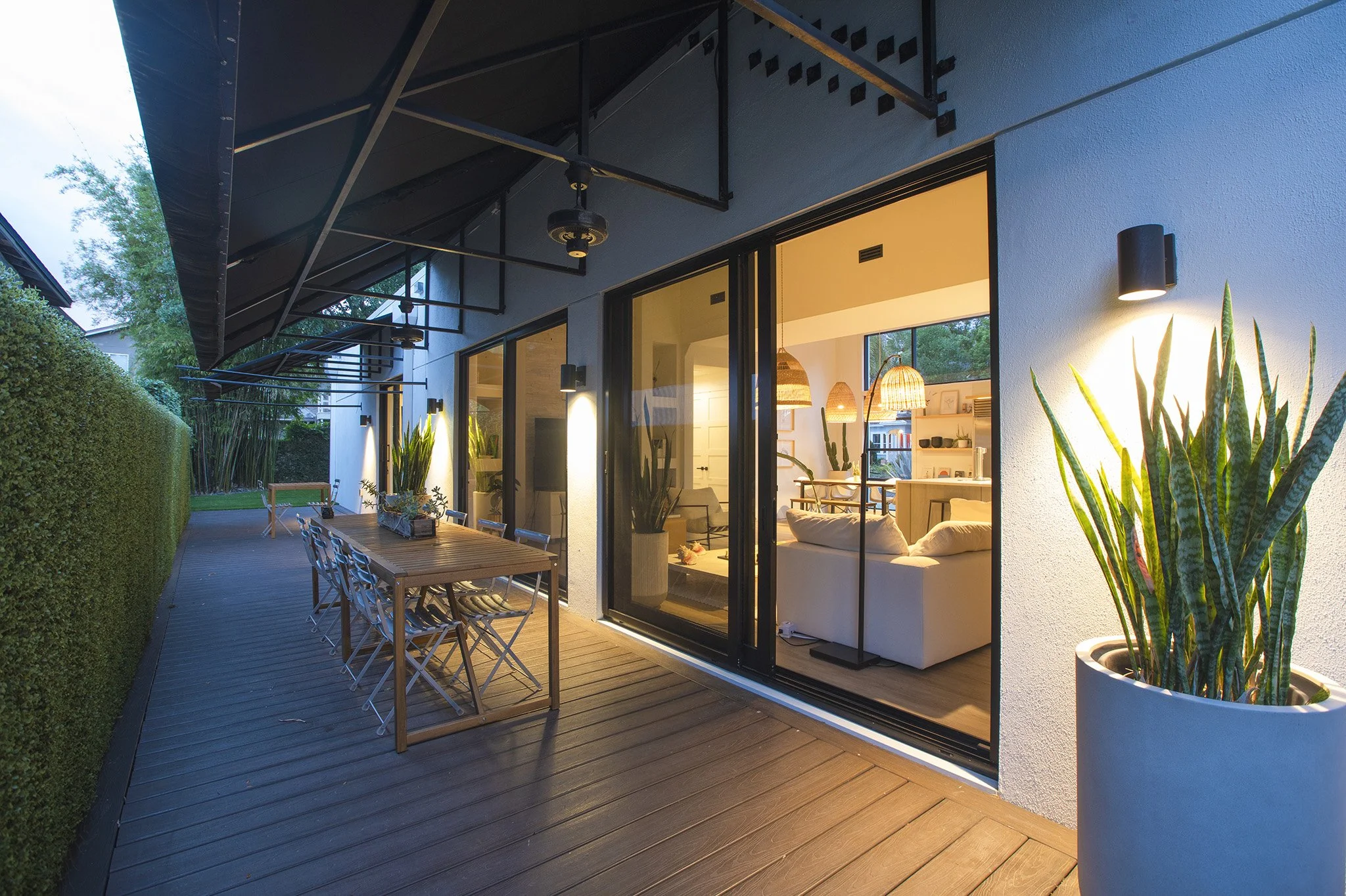 modern-home-winter-park-fl-446-melrose-24-outdoor-dining-evening-lighting.jpg