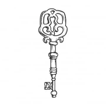 An antique skeleton key with an ornate top design.