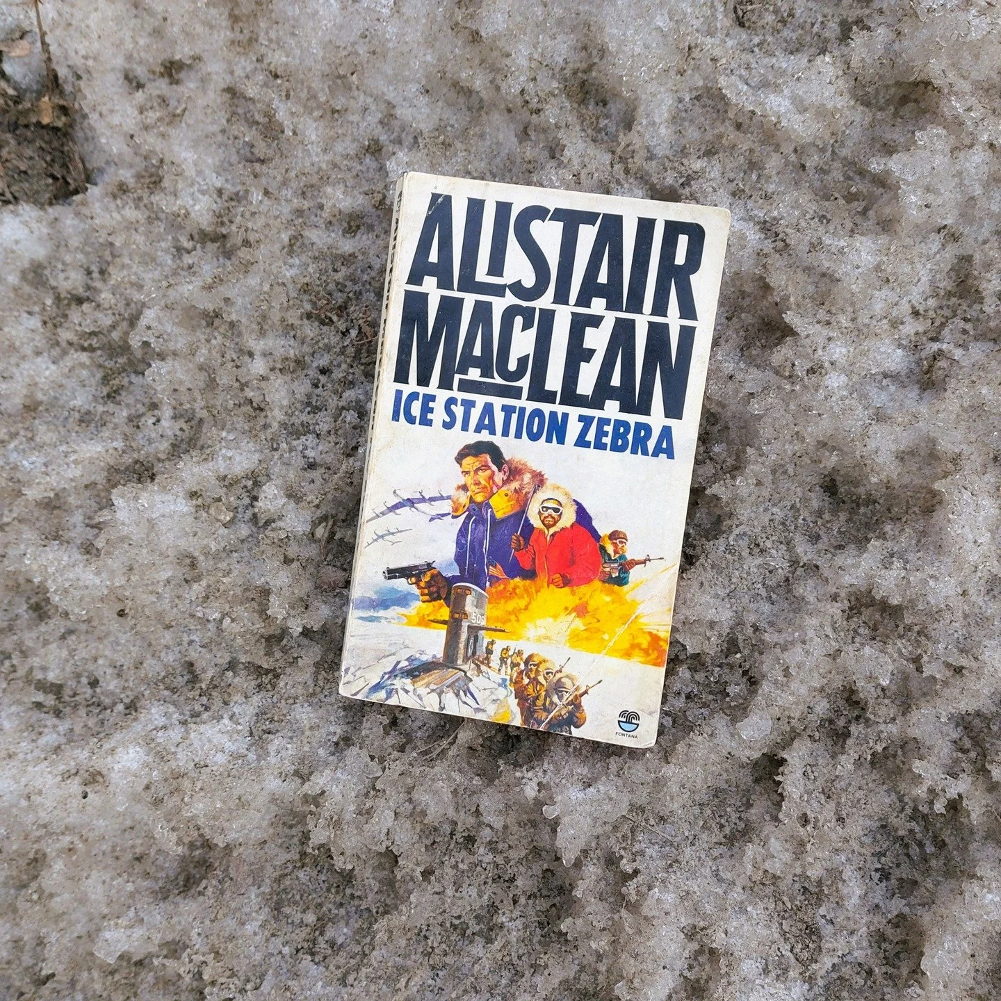 Ice Station Zebra by Alistair MacLean

UNDER THE POLAR ICE-CAP...
The atomic submarine 'Dolphin' has impossible orders: to sail beneath the ice-floes of the Arctic ocean to locate and rescue the men of weather-station Zebra, gutted by fire and drifti