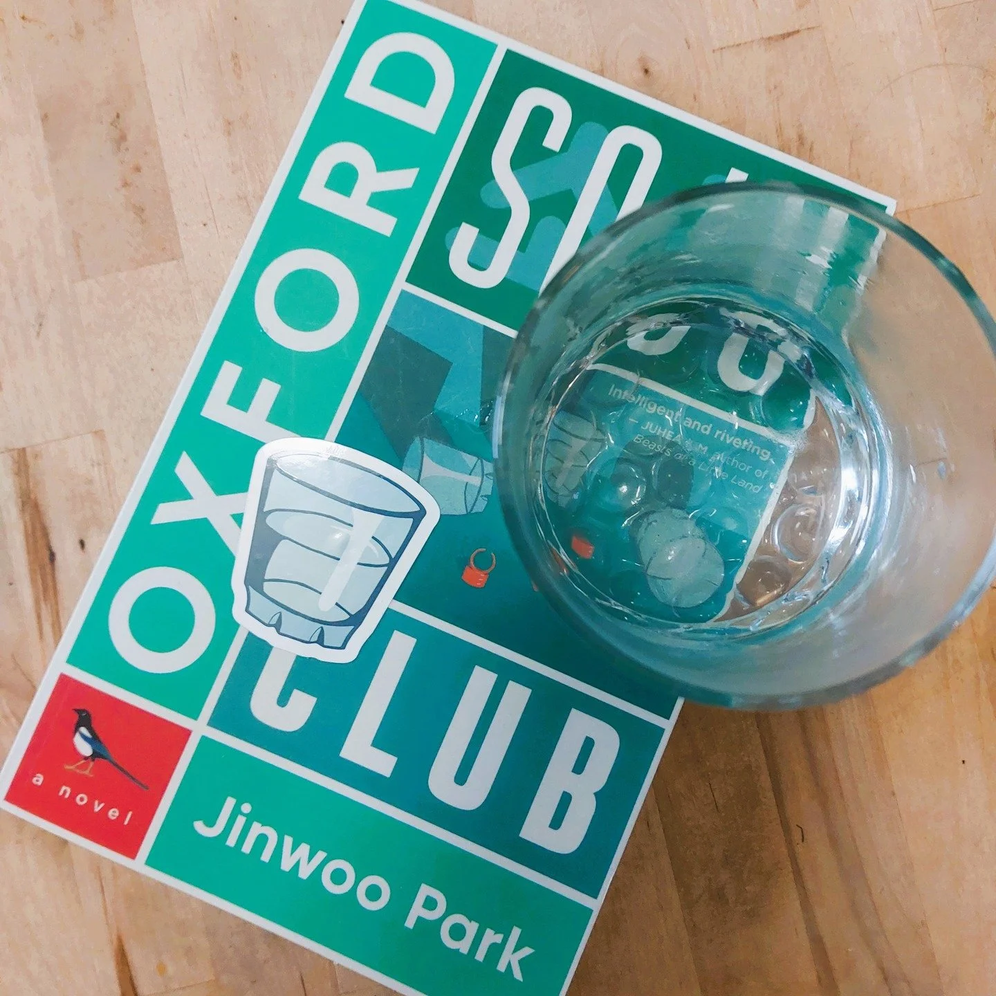 Oxford Soju Club by Jinwoo Park

"The certainty in her tone, that he would be here when she returned, amuses him. As if another possibility is unthinkable to her. Scenarios can infinitely diverge, and all he can trust is what he can see and hear