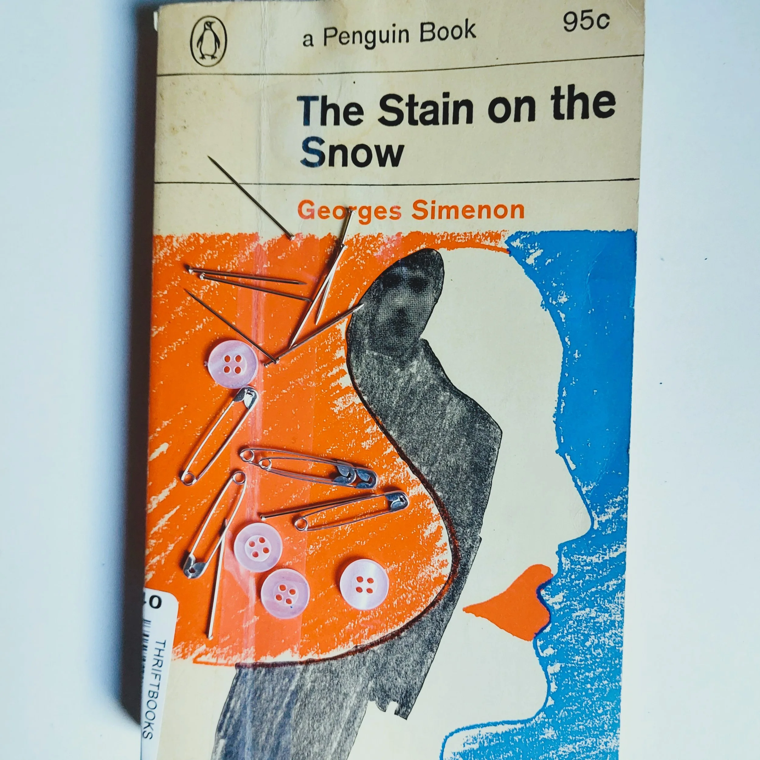 The Stain on the Snow by Georges Simenon (also known as Dirty Snow, or Black Snow, en francais Le Neige Etait Sale)

Great book, great cover. Great cover, great book (do I say that all the time? This time I really mean it.)

"This was not the pl