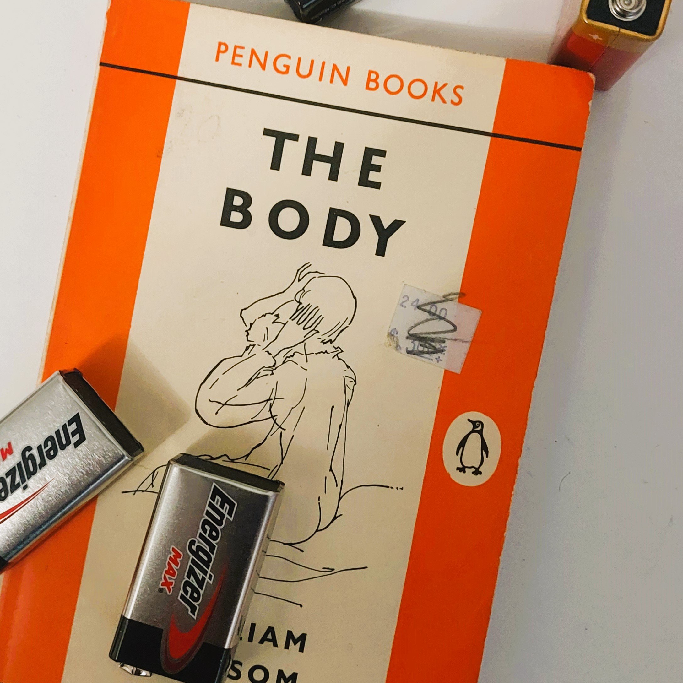 The Body by William Sansom

The atmosphere became in an instant animated. The idea of such good fortune -- which must have suddenly seemed possible for everyone present -- enlivened the fairy lights, a sudden gold tooth in the mouth of the barmaid, t