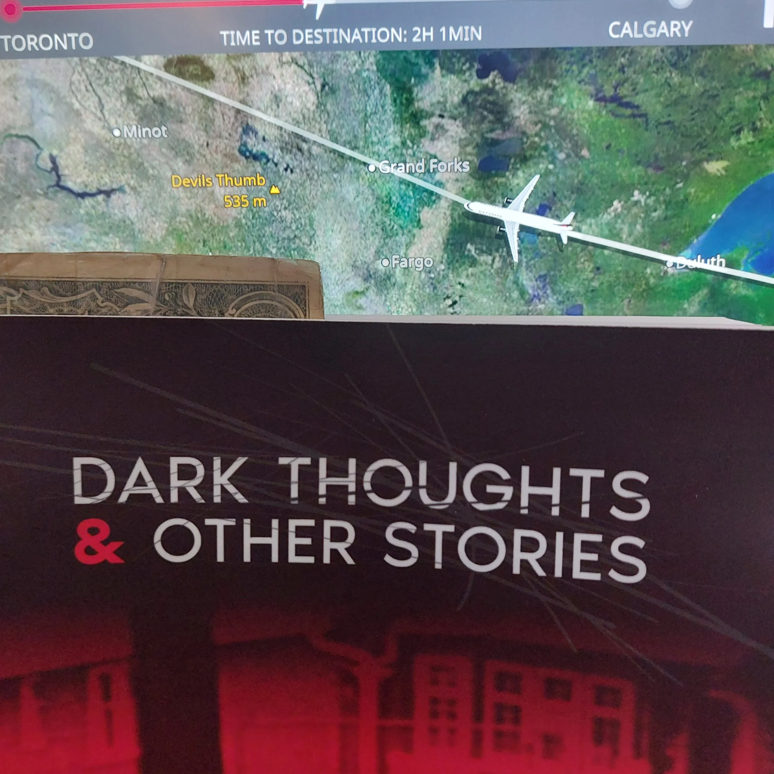 Dark Thoughts by Hope Thompson

...so how often are you reading a story about Grand Forks right while you are flying over Grand Forks? 

It's only happened to me once. 

Great collection of stories from Hope Thompson. My favourites: Locked Room Myste