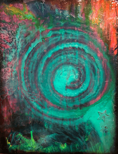 Paint pour with a turquoise swirl in the center of the canvas