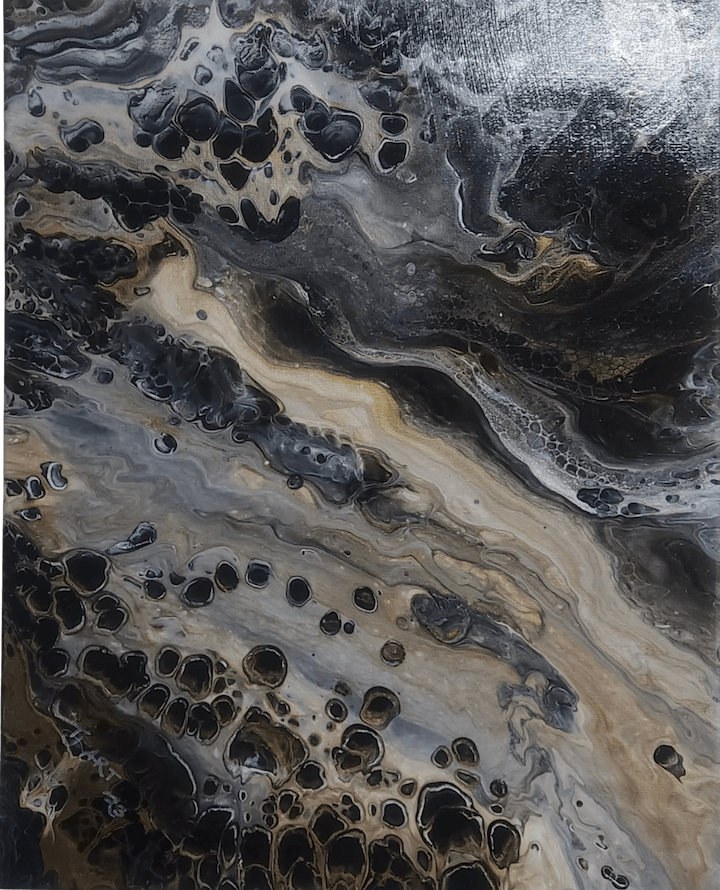 Black, white, and tan paint pour done by Tamra