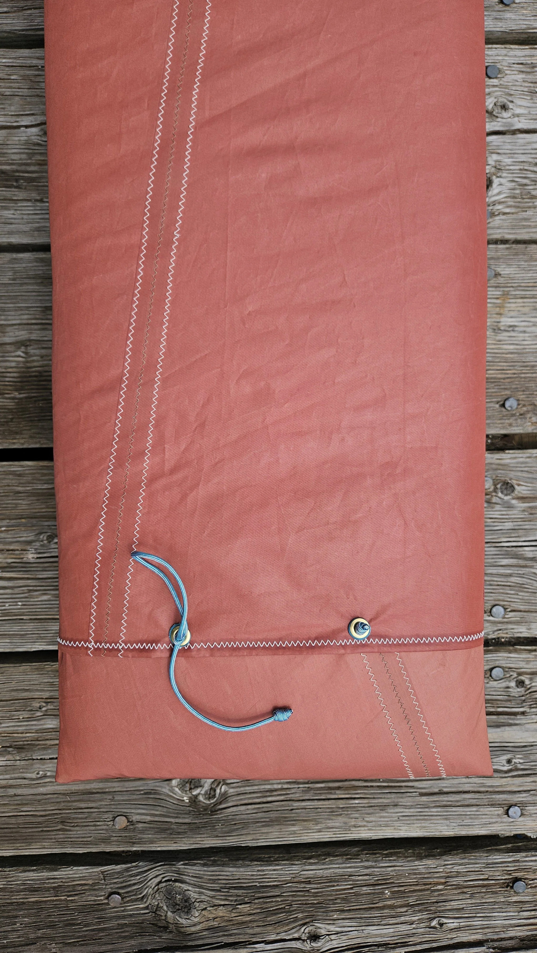 Red sailcloth upholstery cushion