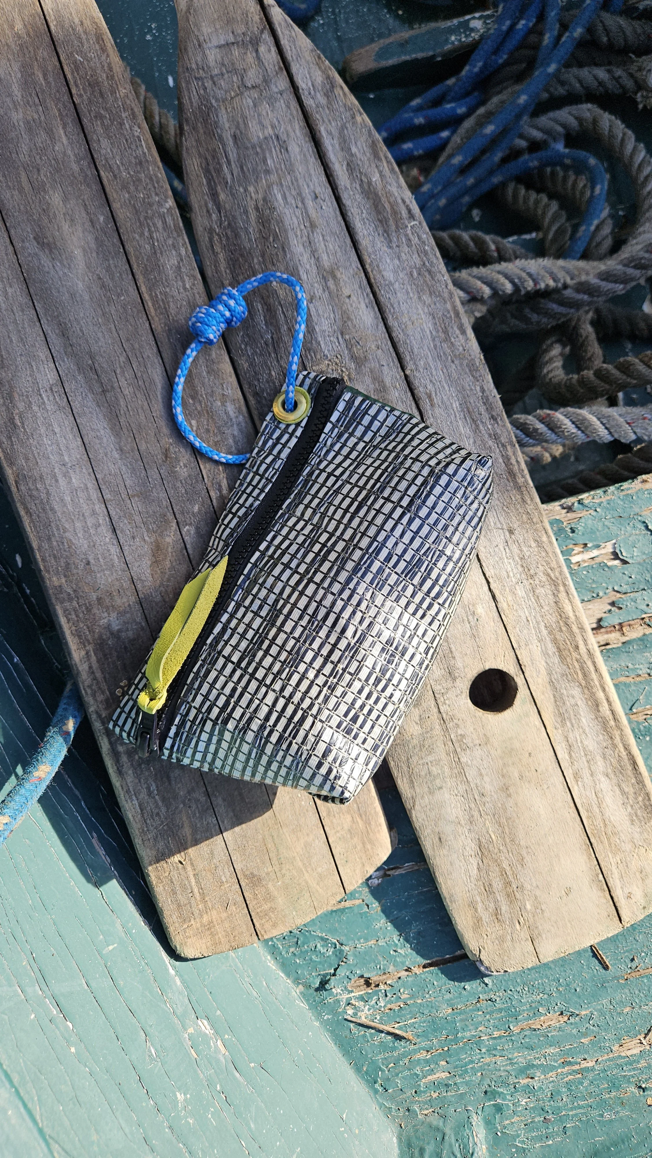reclaimed sailcloth zip pouch with rope lanyard