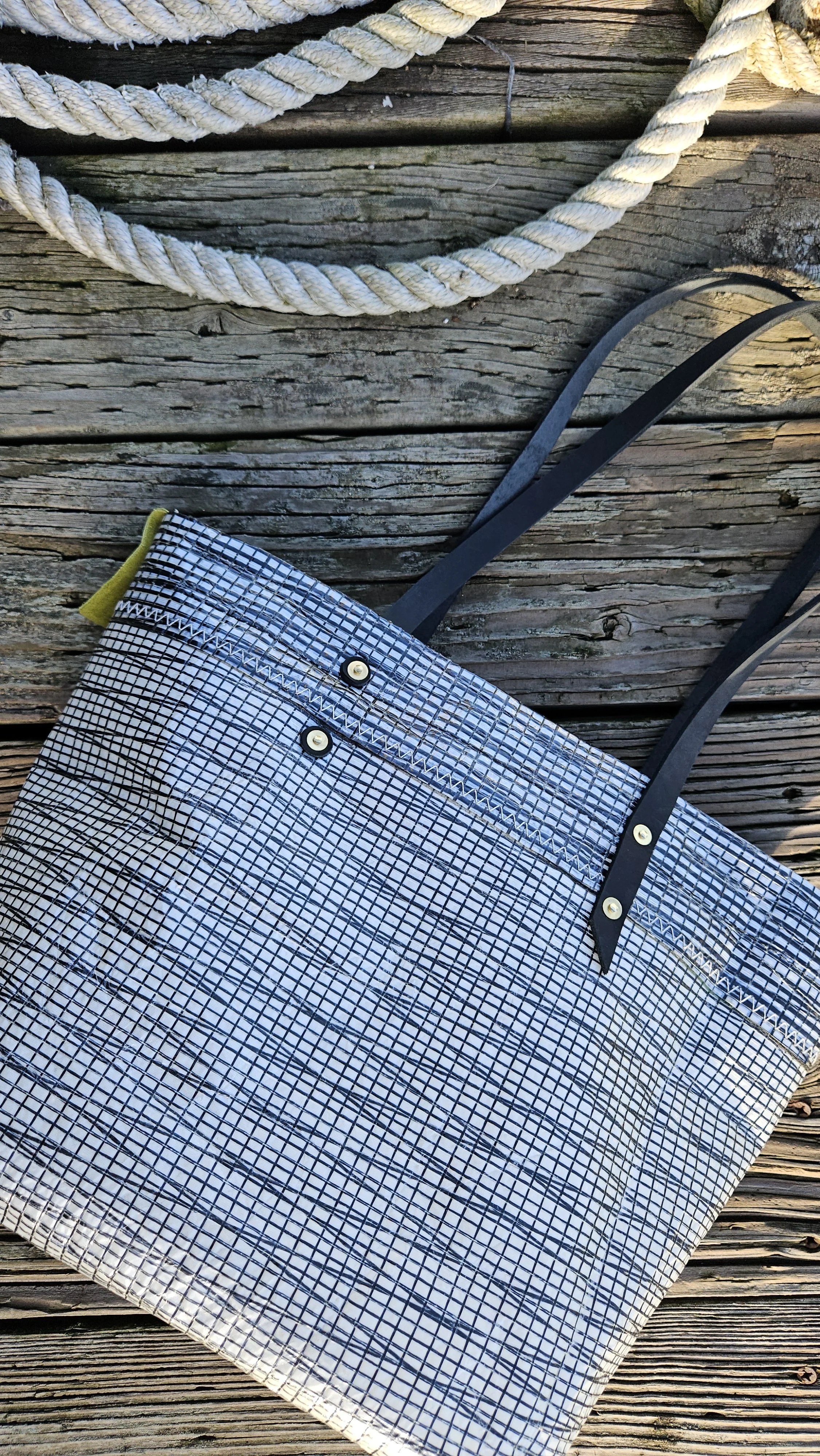 Recycled sail bag black and white with black leather straps