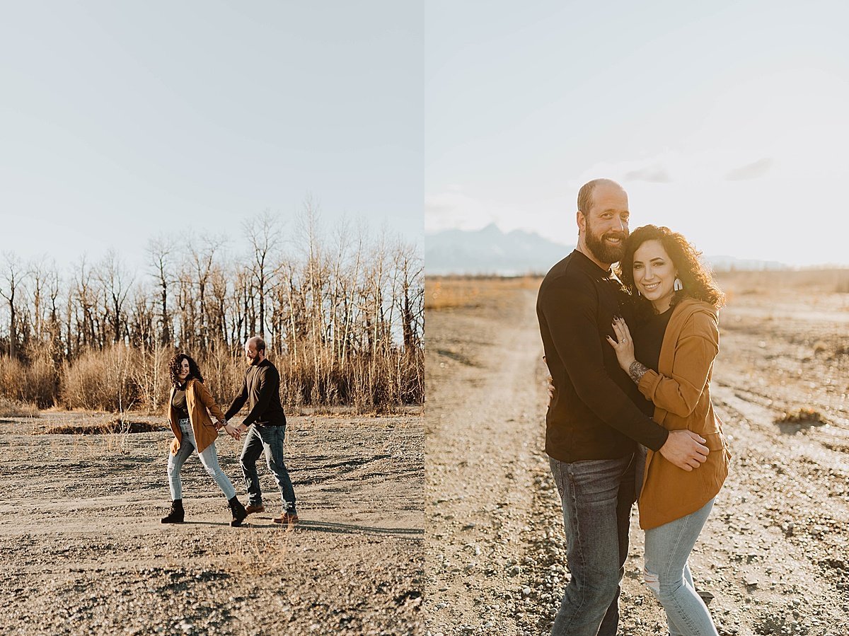  Engaged couple walk through mountain forest in shoot by Alaska wedding photographer 
