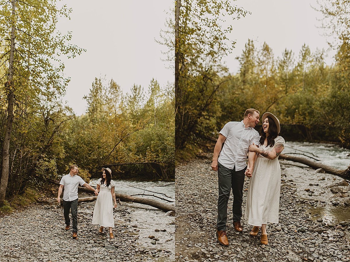  Happy couple wander by the river in adventure outdoor shoot 