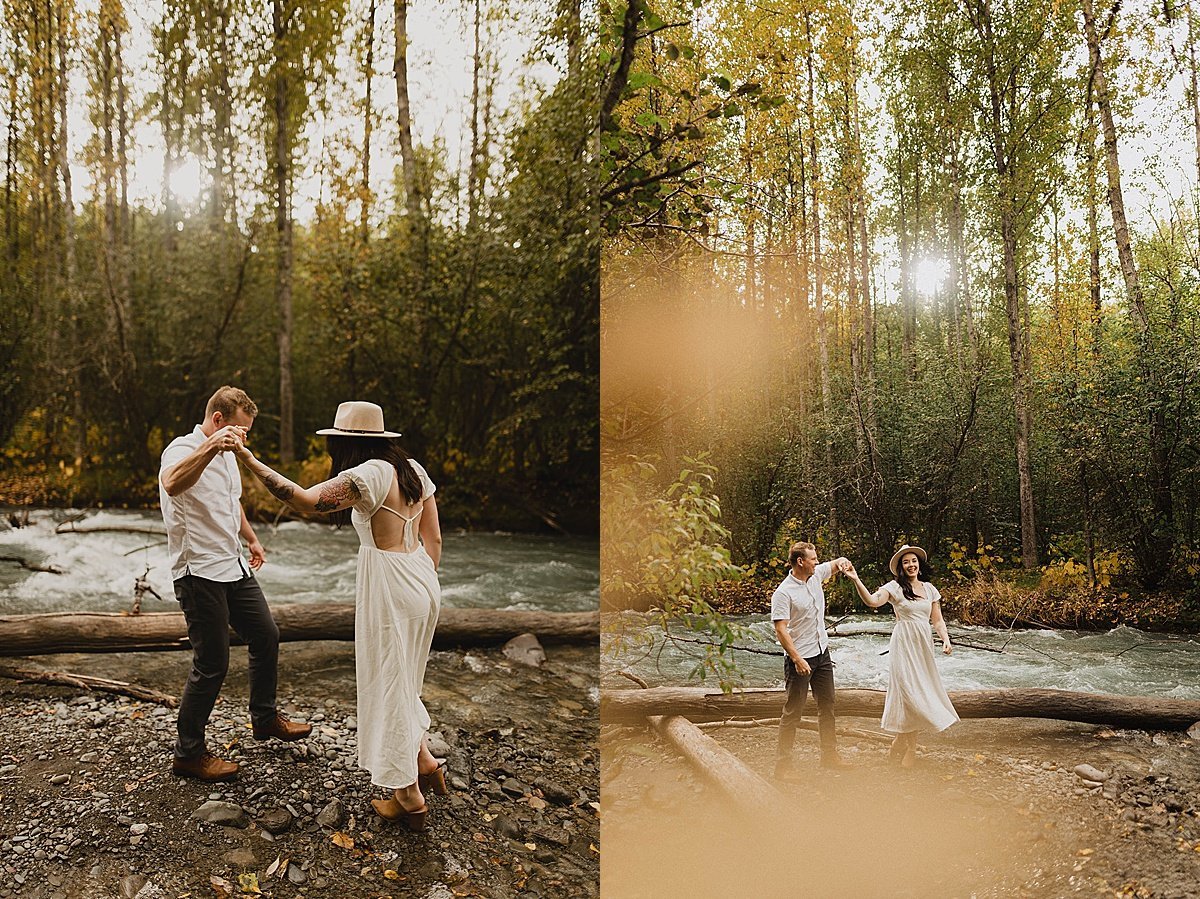  Couple dance on the riverbank in woodsy engagement shoot by alaska wedding photographer Theresa McDonald 