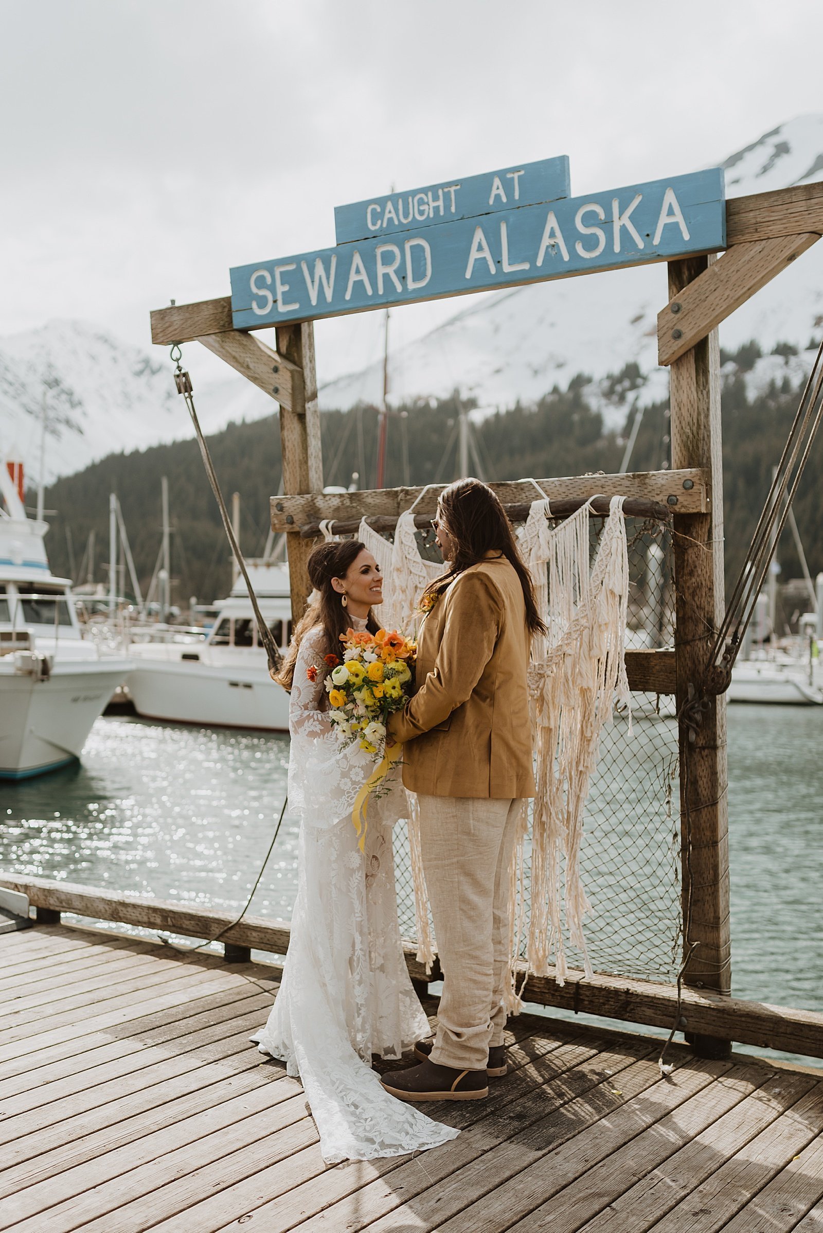  Man and woman on a dock at their Retro Seward Styled Shoot 
